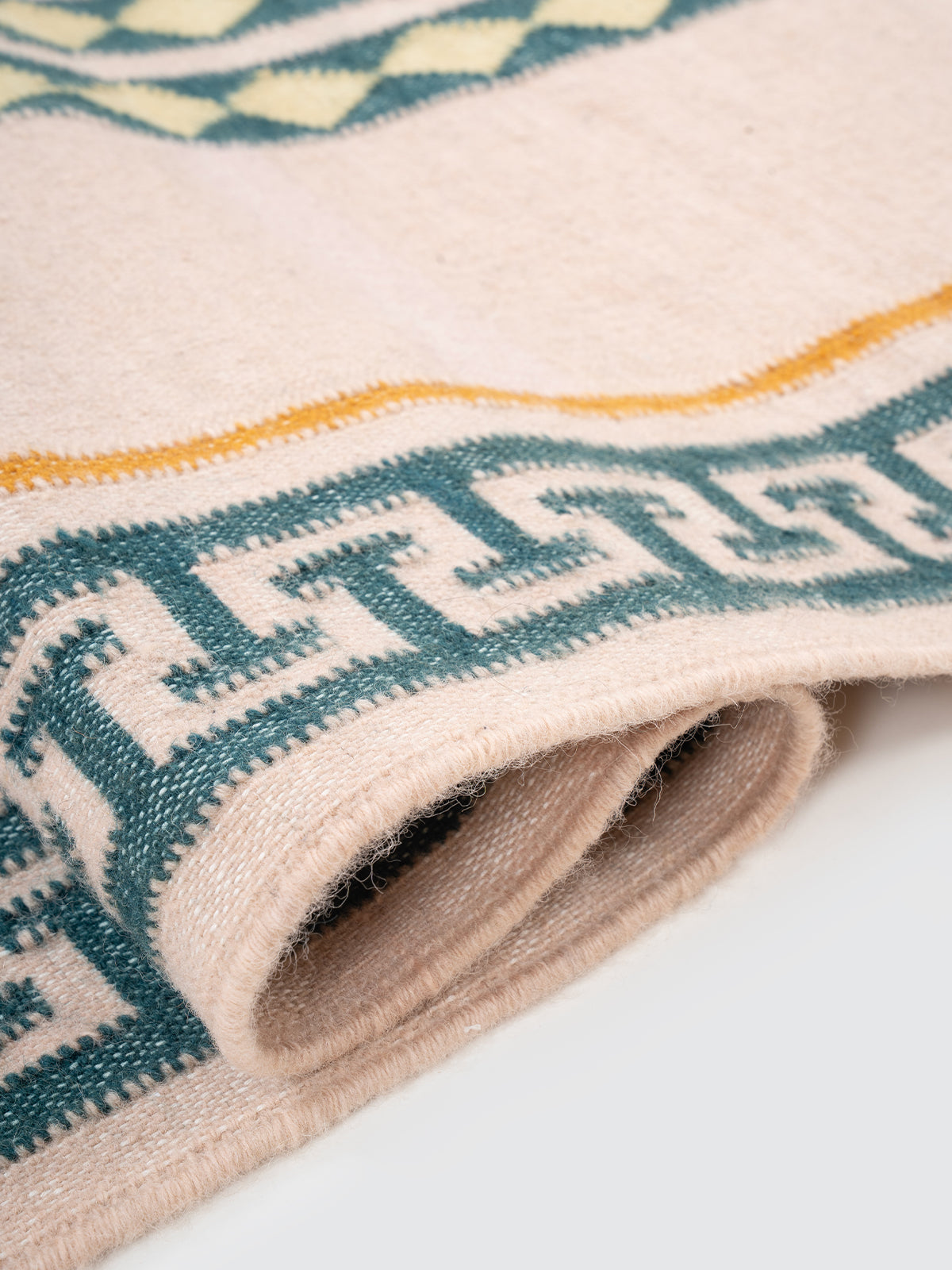 The Palace Key Runner-Pink - cotton runner laid in a hallway view