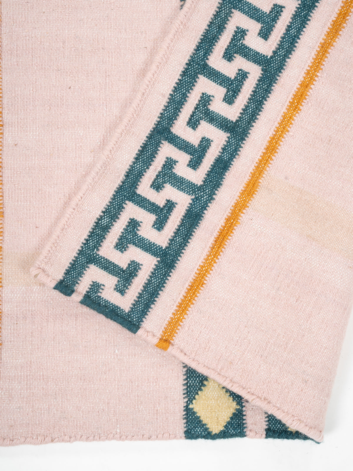 The Palace Key Runner-Pink detail showing edge binding and cotton finishing of the runner