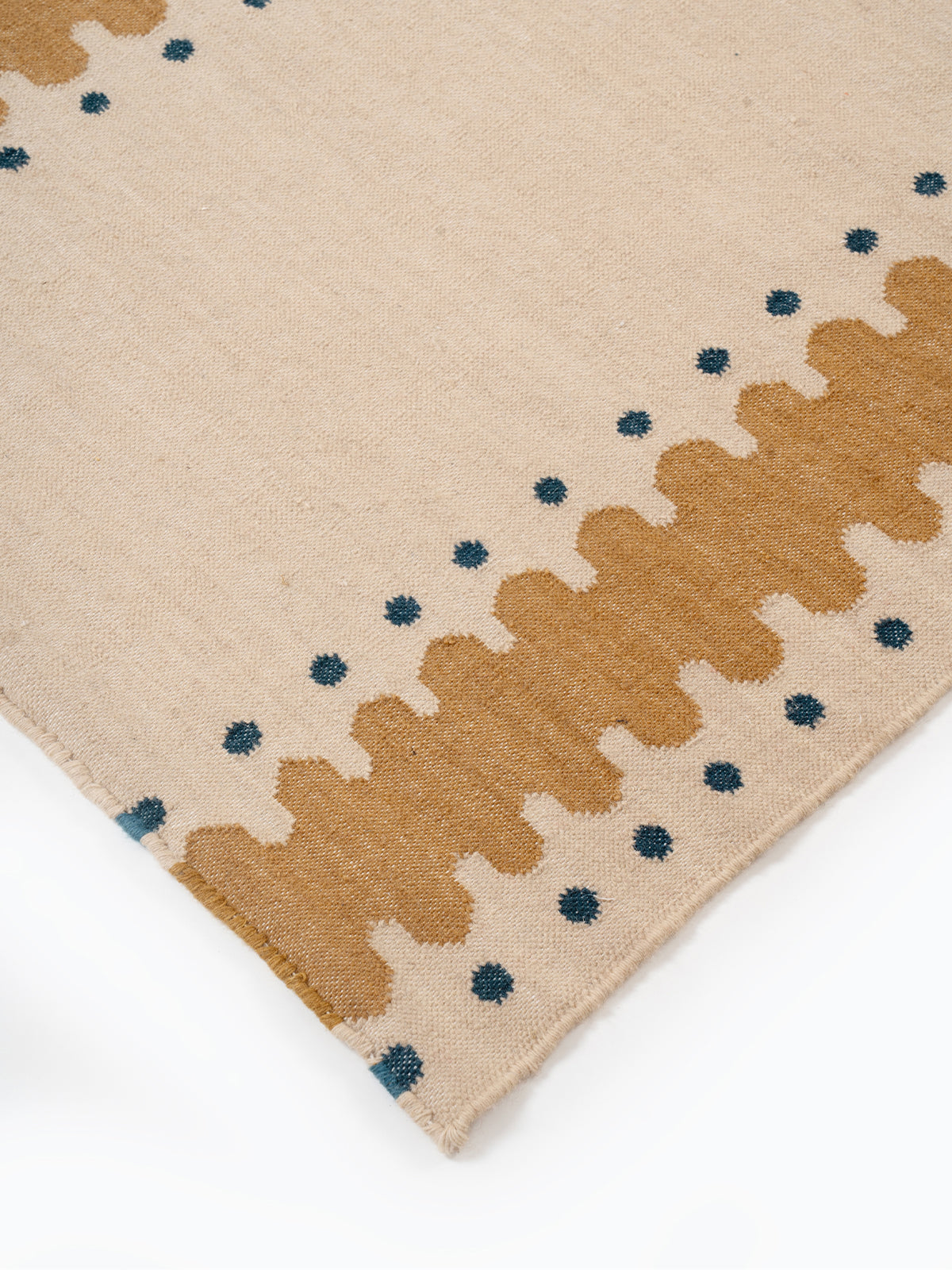 The Pebble Trail Runner close-up showing the wool weave and texture surface