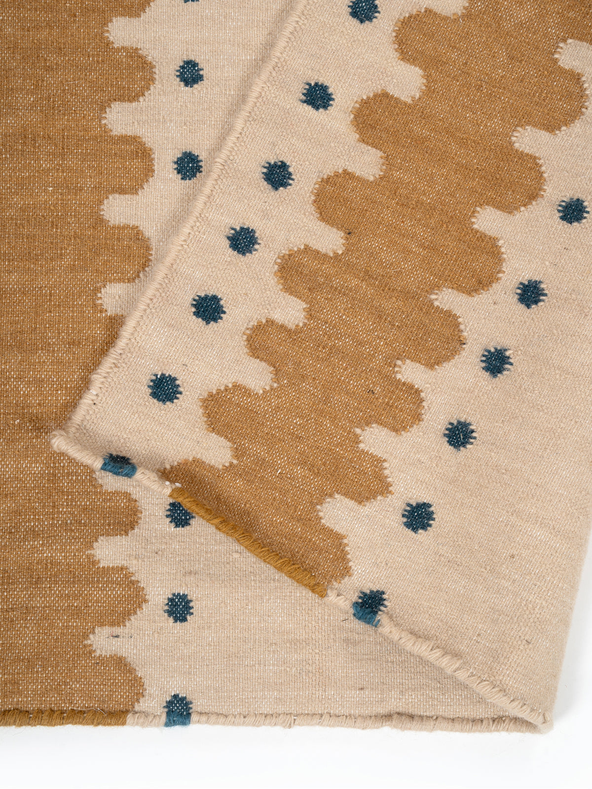 The Pebble Trail Runner detail showing edge binding and wool finishing of the runner