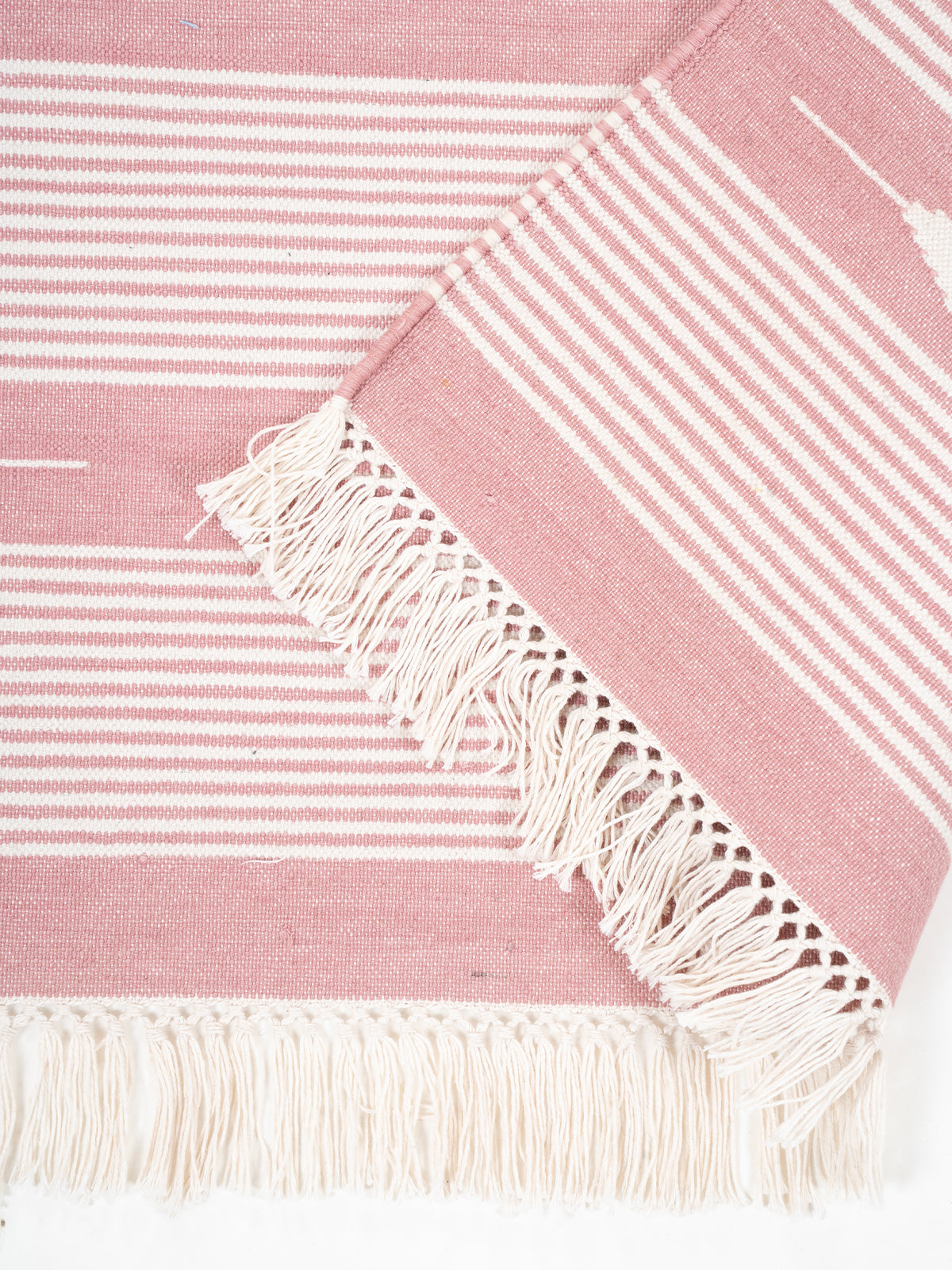 The Petal Path Runner detail showing edge binding and cotton finishing of the runner
