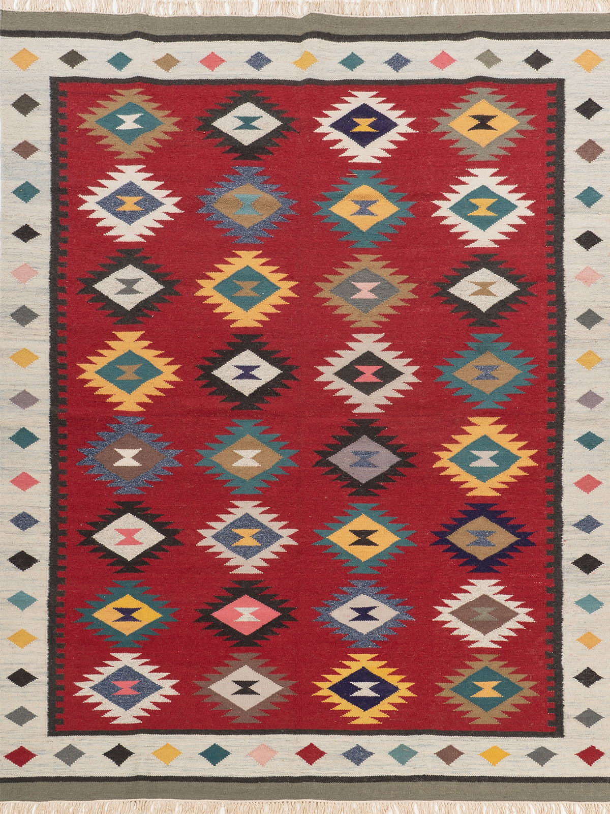 The Ruby Diamond Rug wool rug in red tones