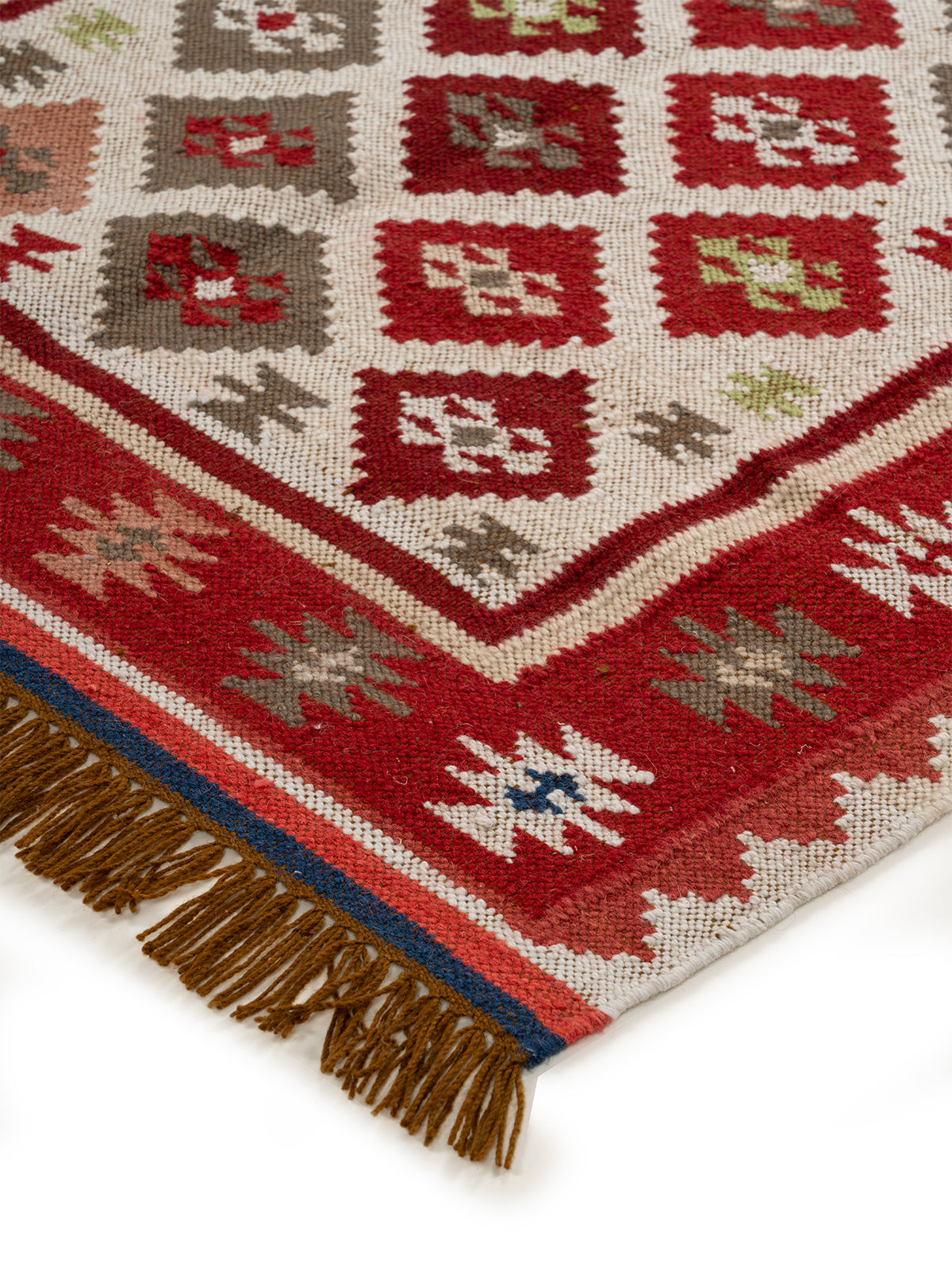 The Rustic Diamond Rug close-up showing the wool weave and geometric motif