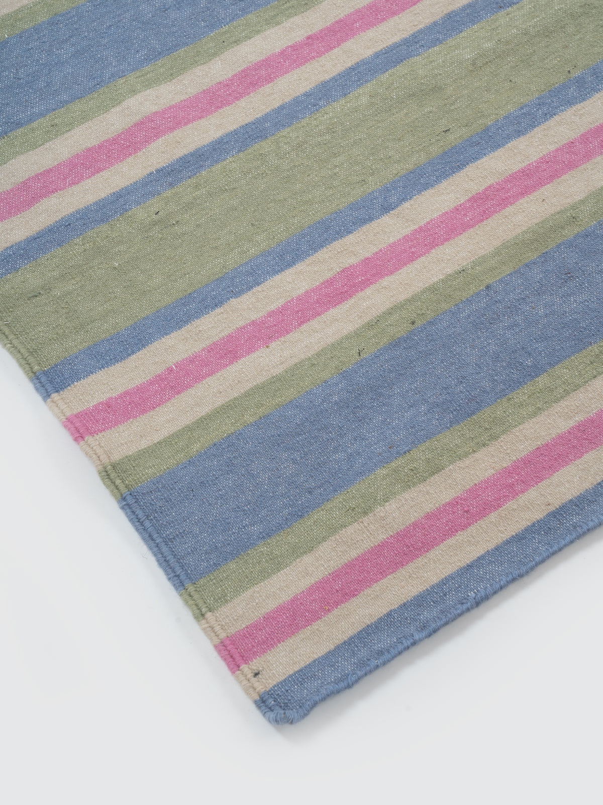 The Sky Blush Runner close-up showing the cotton weave and stripes surface