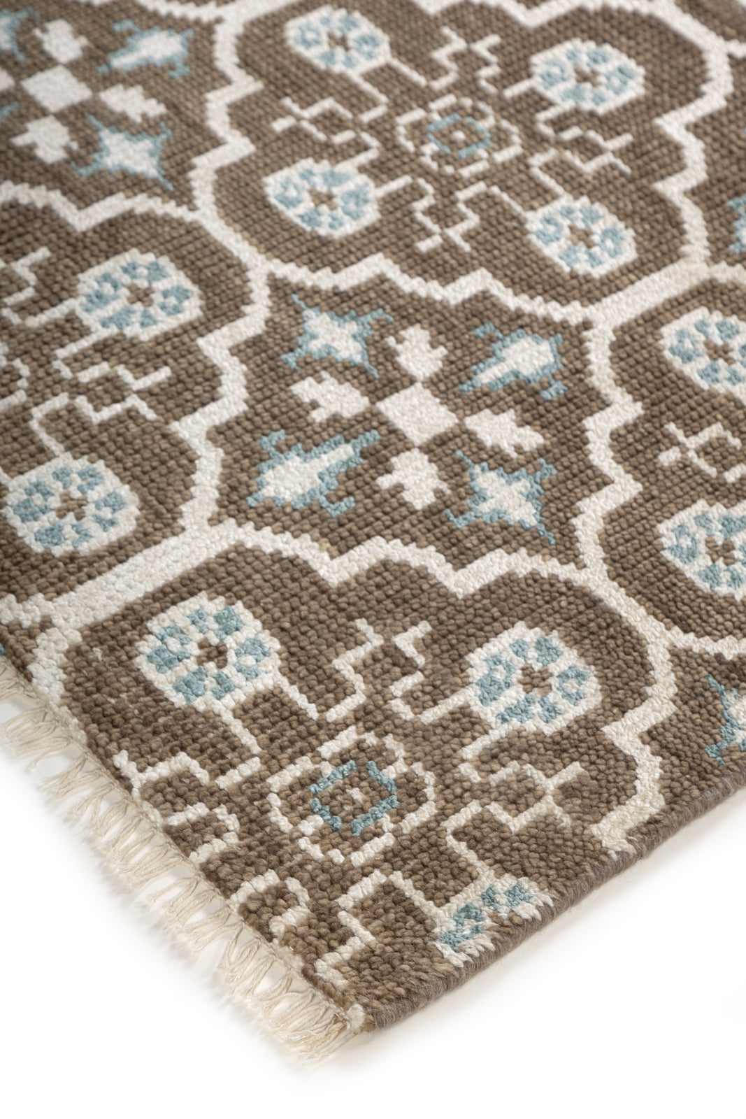 The Still Loom close-up showing the wool weave and surface texture