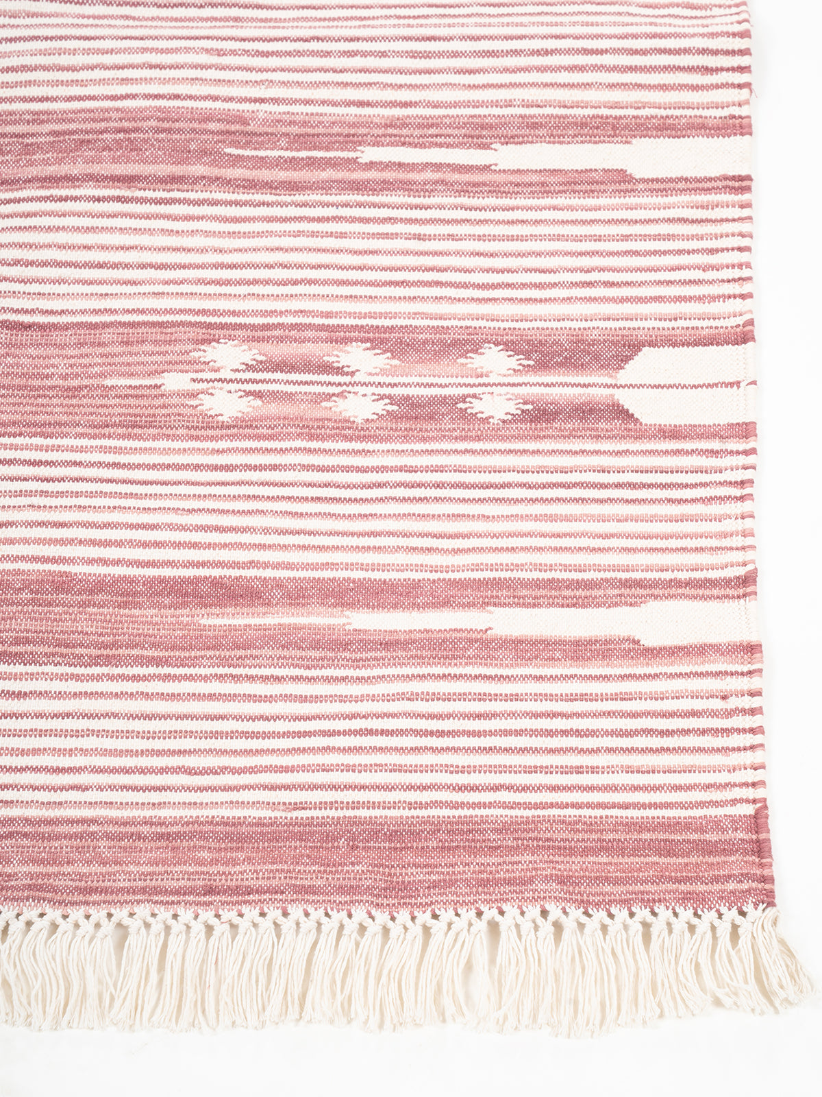 The Subtle Bloom Runner-Pink cotton stair runner styled on a staircase in a designed interior