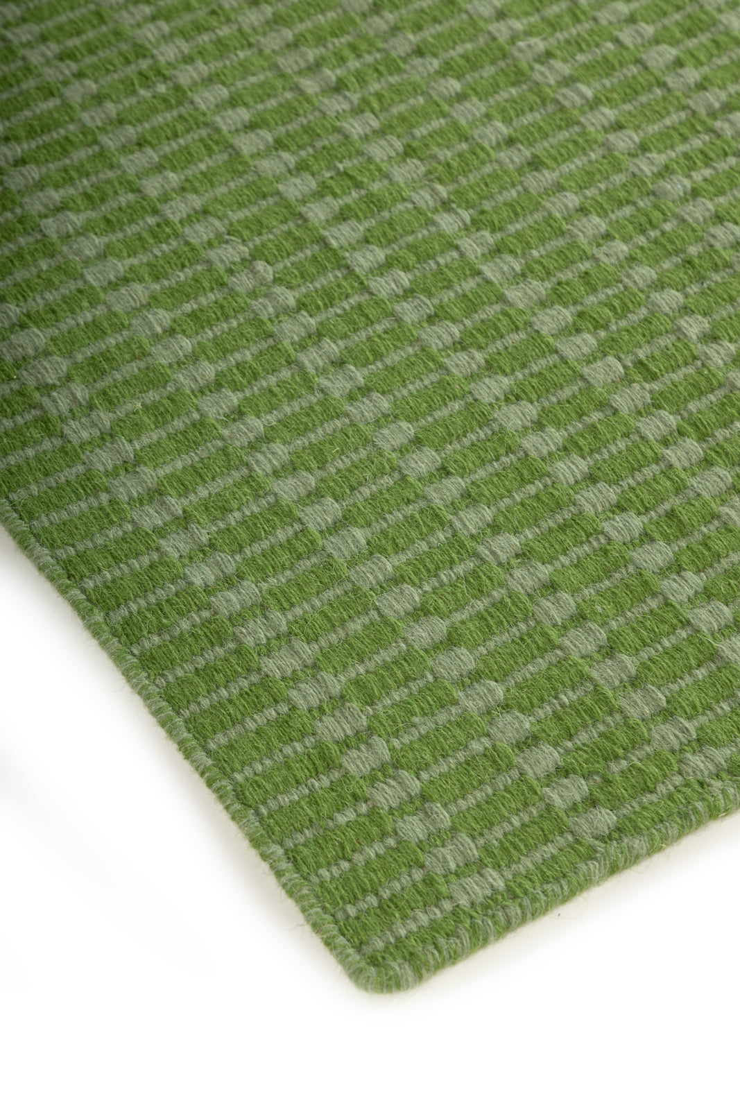 The Subtle Lineage close-up showing the wool weave and striped pattern