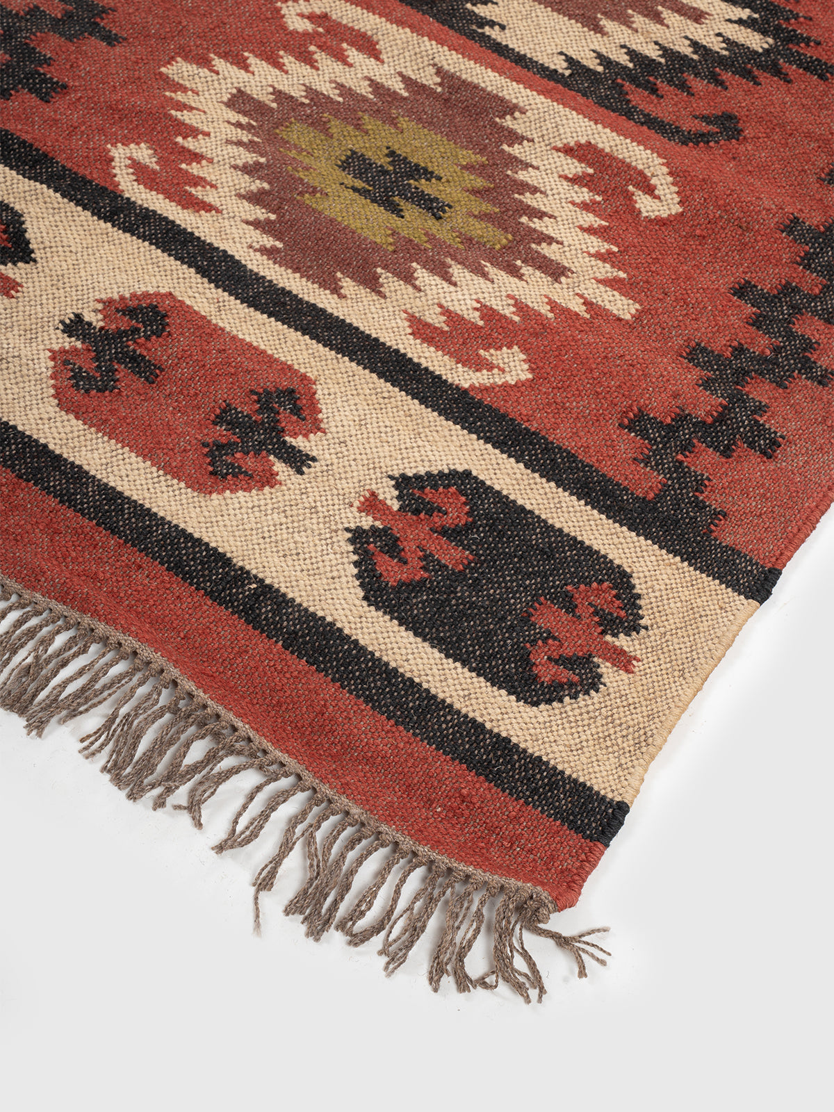 The Terra Spirit Runner close-up showing the wool weave and traditional surface