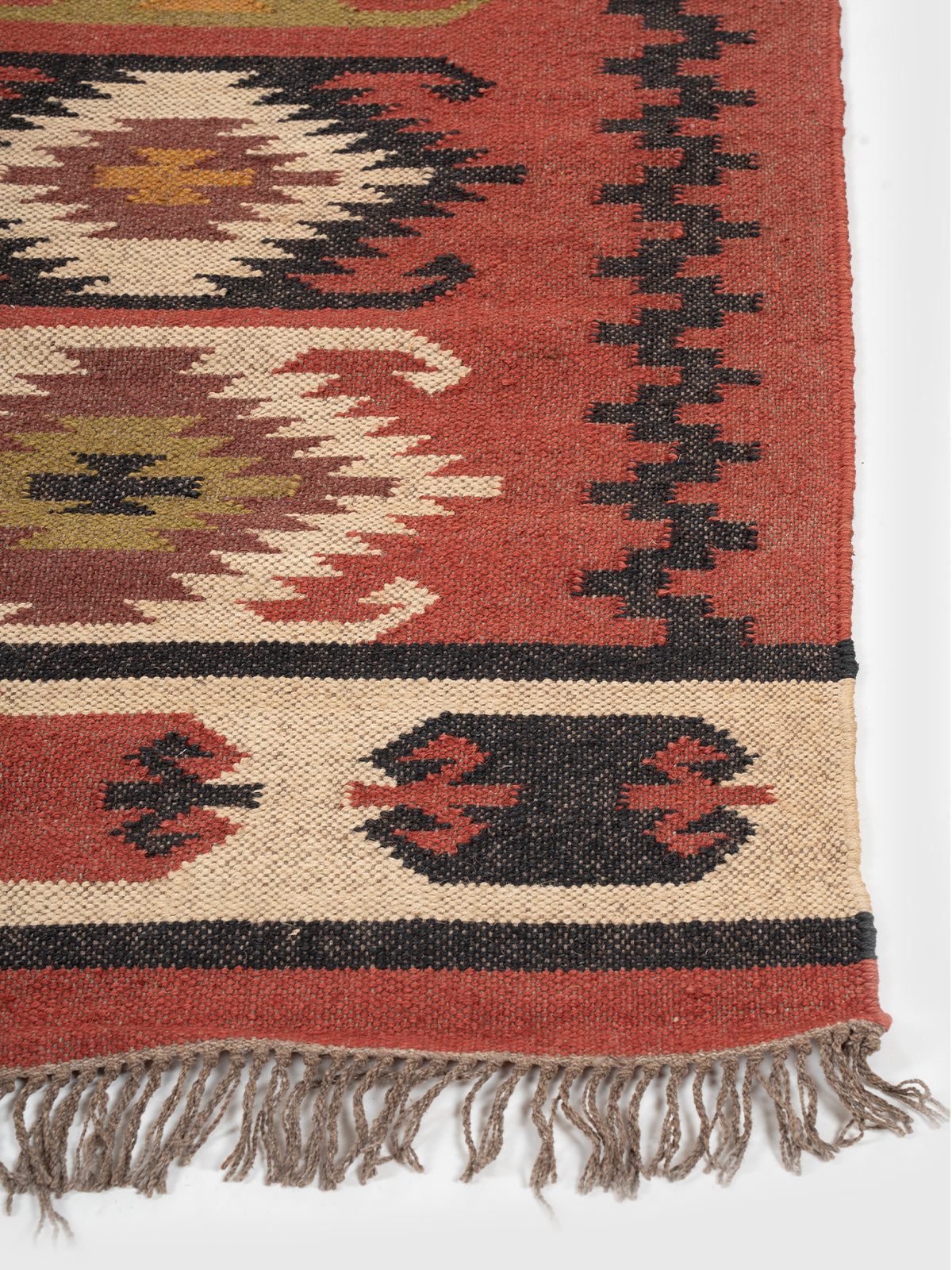 The Terra Spirit Runner wool stair runner styled on a staircase in a designed interior