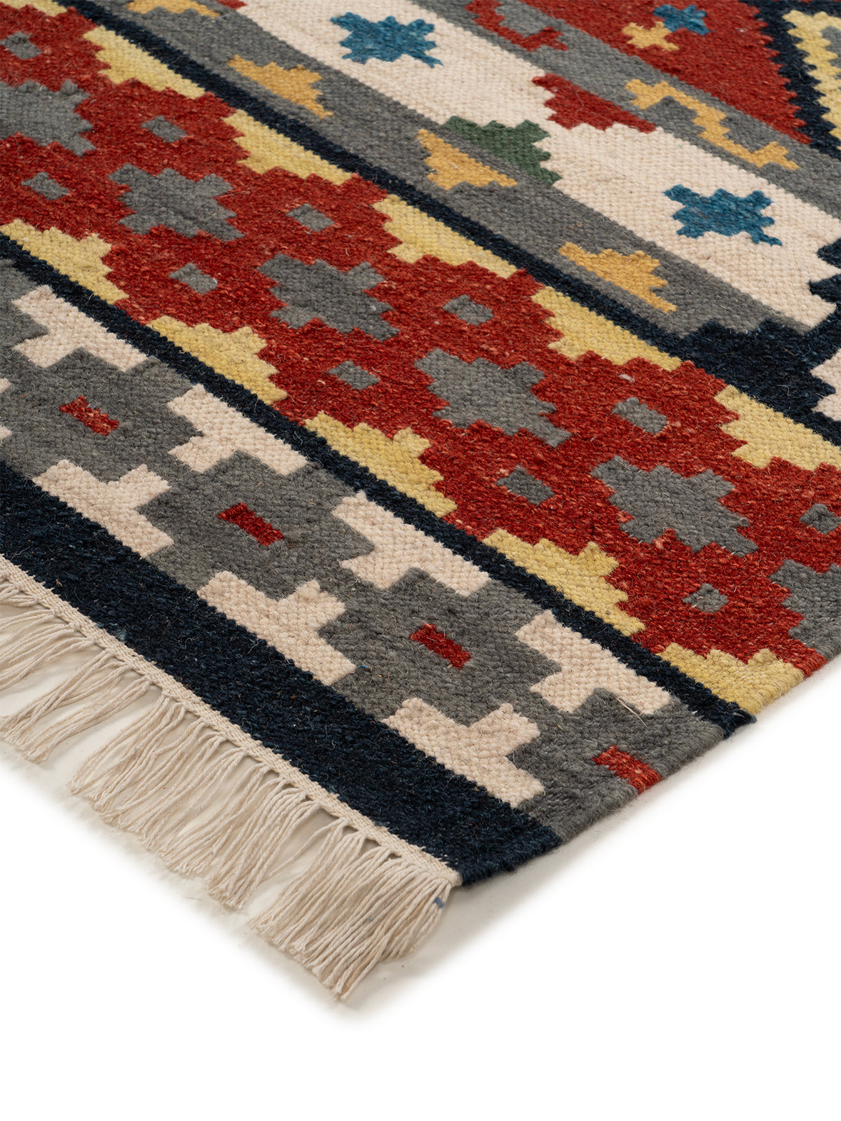 The Tribal Fortress Rug close-up showing the wool weave and traditional motif