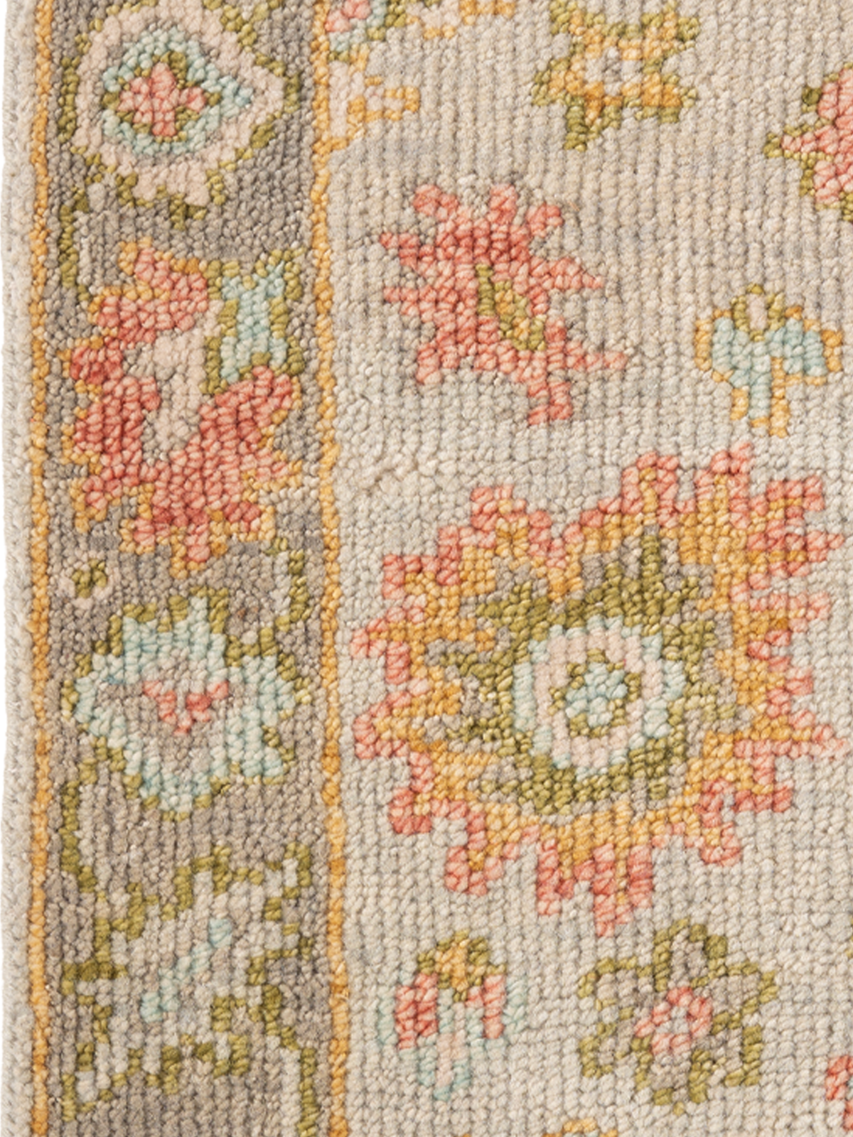 The Wildflower Hearth close-up showing the nz wool pile and floral motif