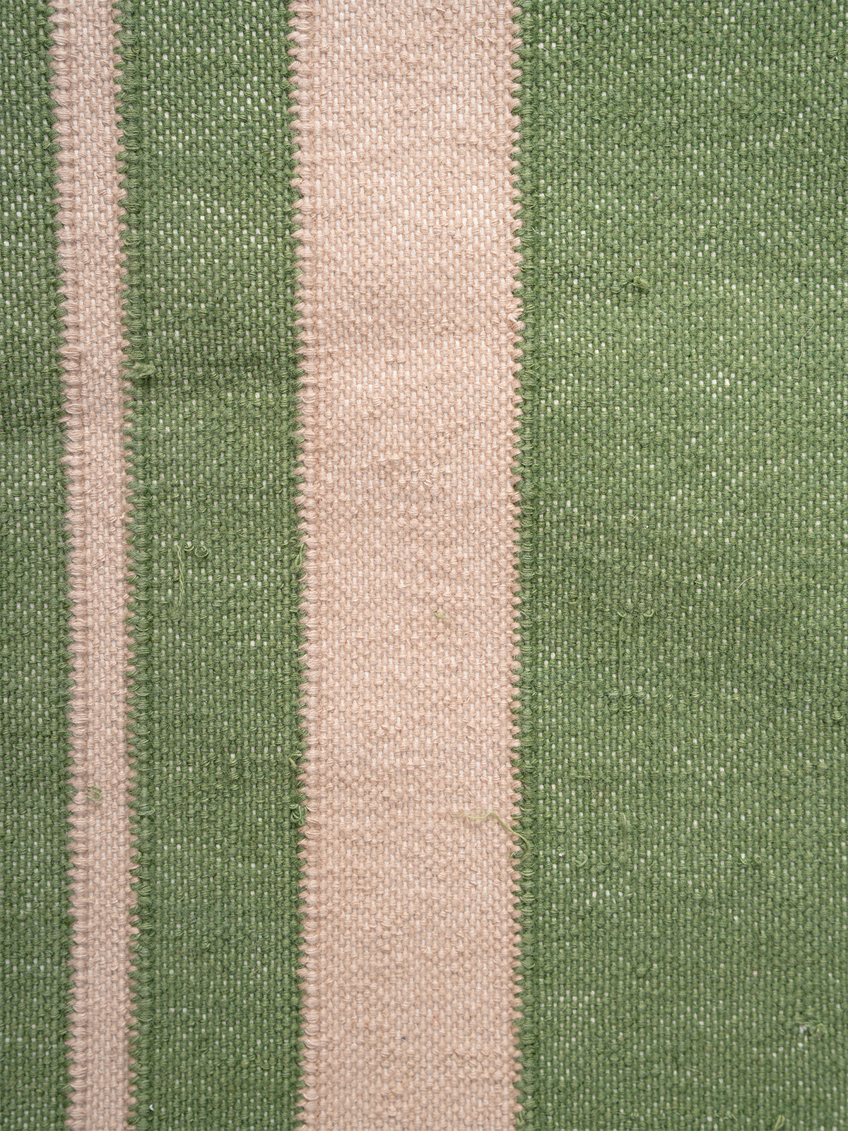 The Zigzag Trail Runner- Basil - cotton runner laid in a hallway view
