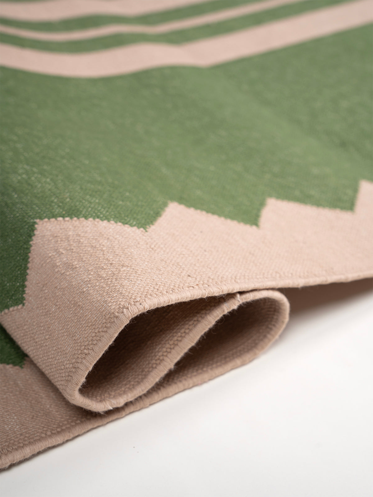 The Zigzag Trail Runner- Basil close-up showing the cotton weave and geometric surface