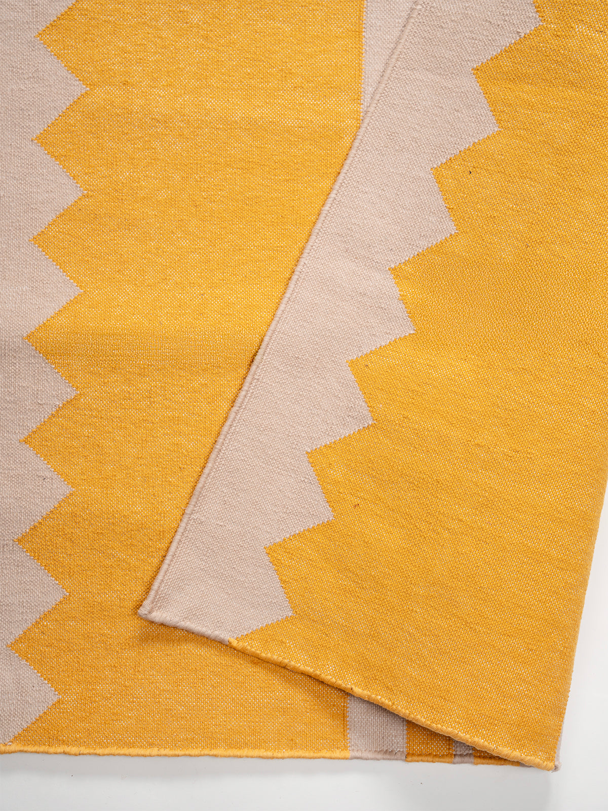 The Zigzag Trail Runner- Lemon - cotton runner laid in a hallway view