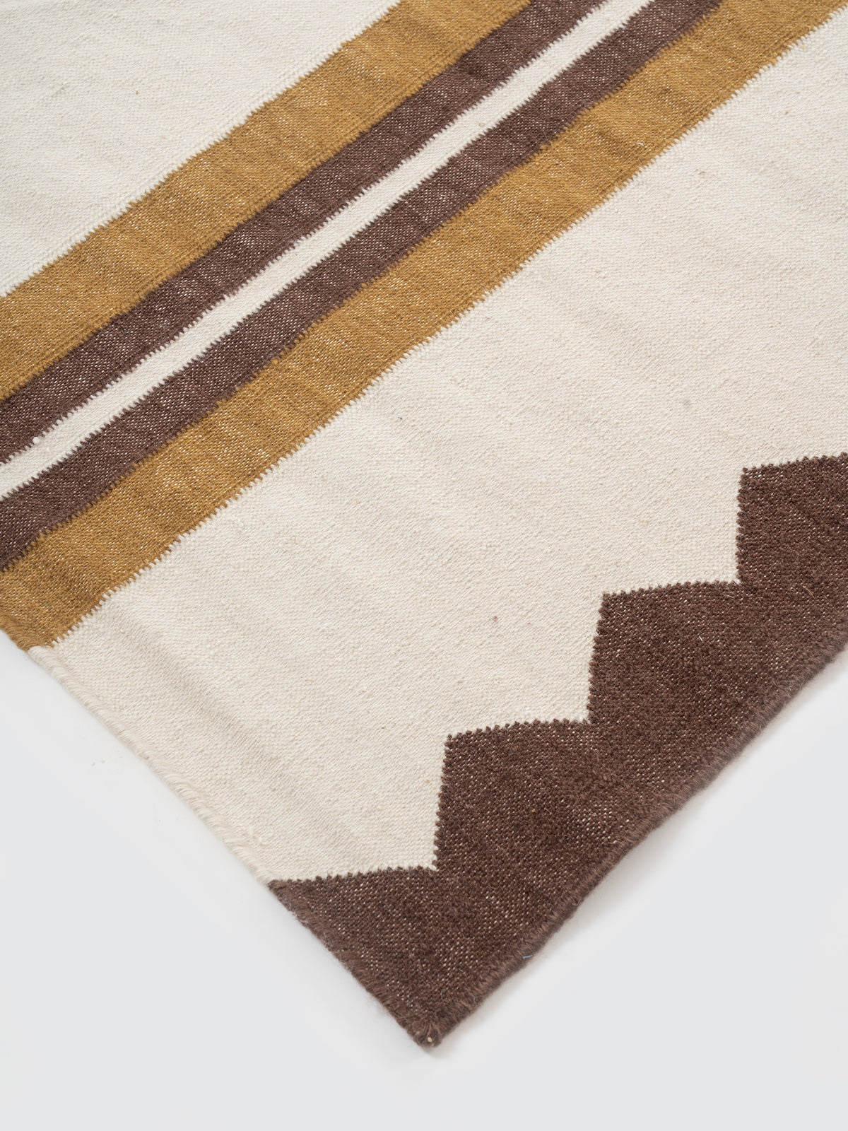 The Zigzag Trail Runner-Pearl close-up showing the cotton weave and geometric surface