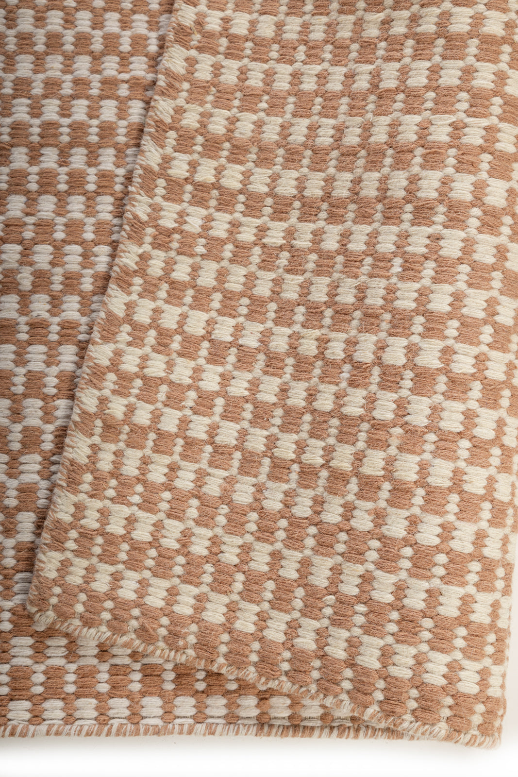 Thistledown Weave detail showing the textured wool surface and finishing
