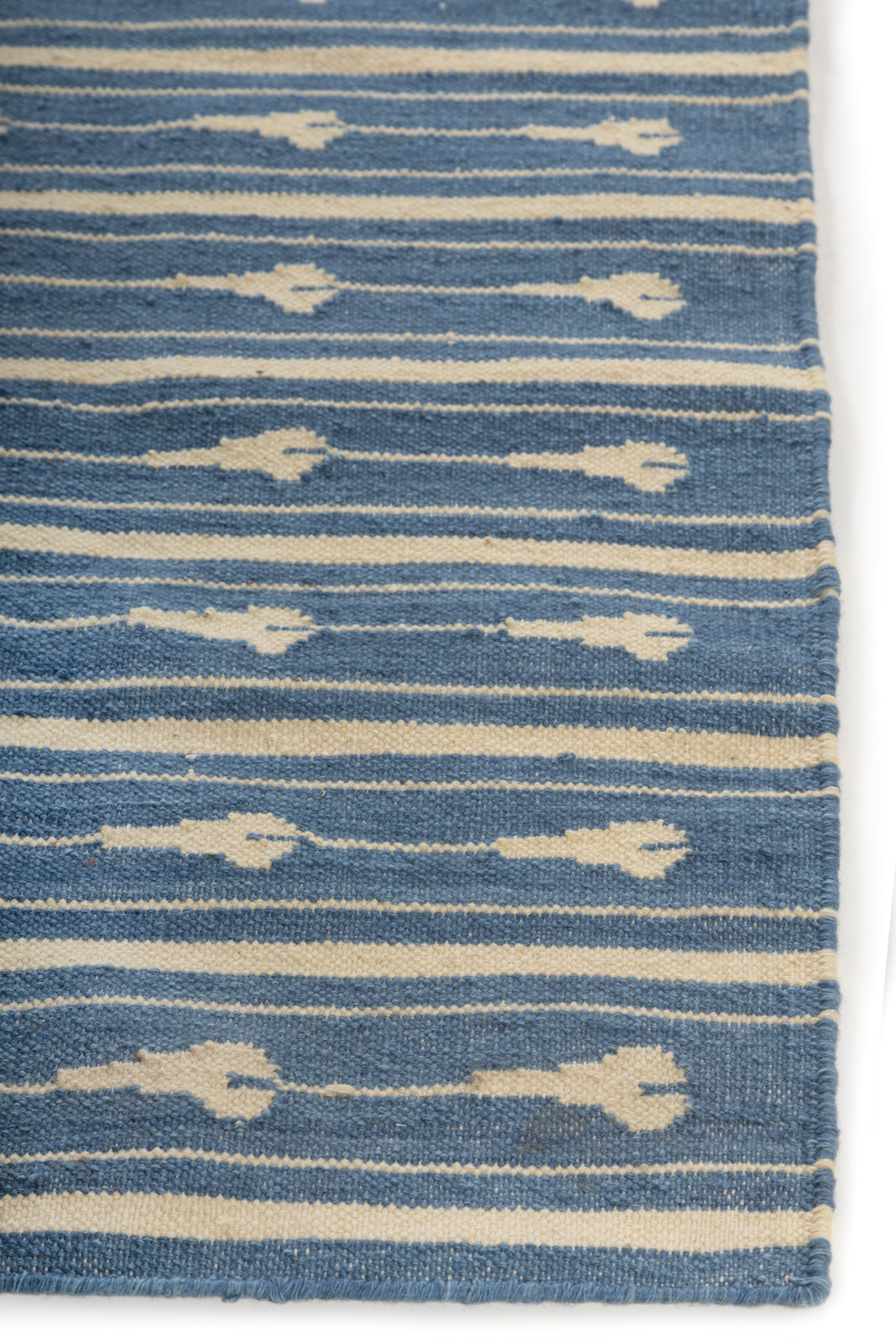 Tideway Wool Rug-Blue wool rug styled in a living room interior