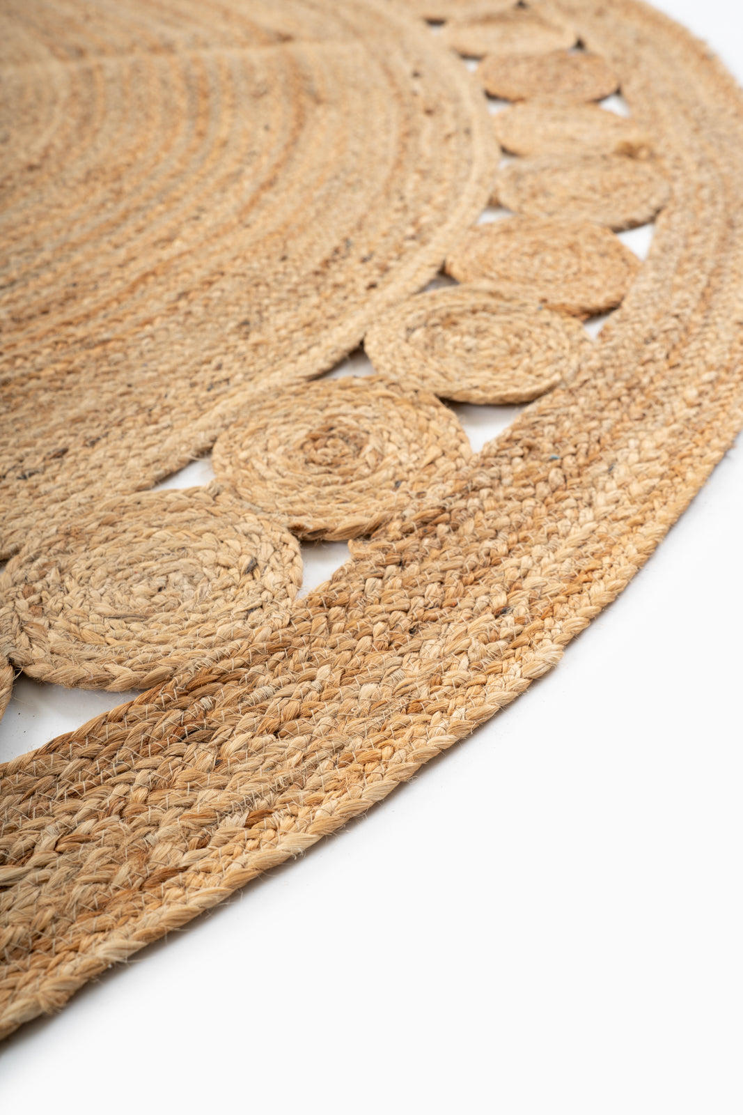 Tunis round jute rug close-up showing the jute weave and surface texture