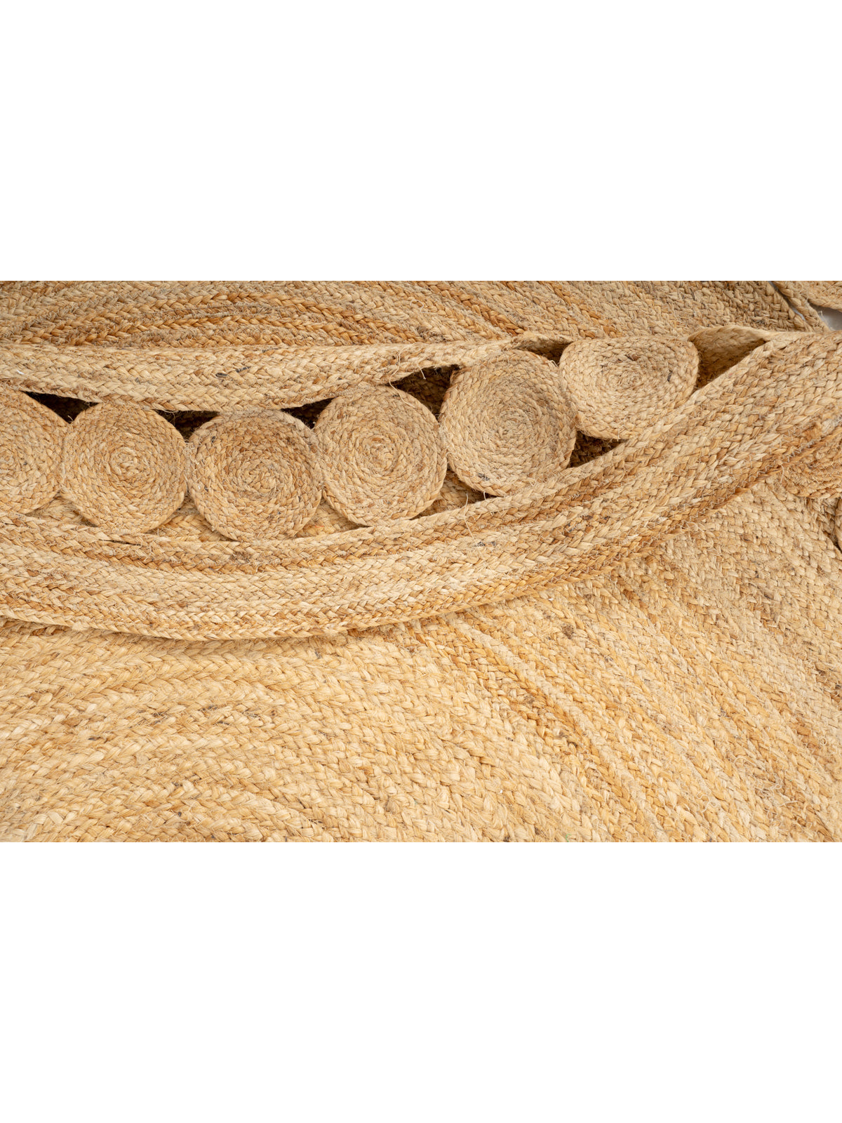 Tunis round jute rug detail showing the textured jute surface and finishing