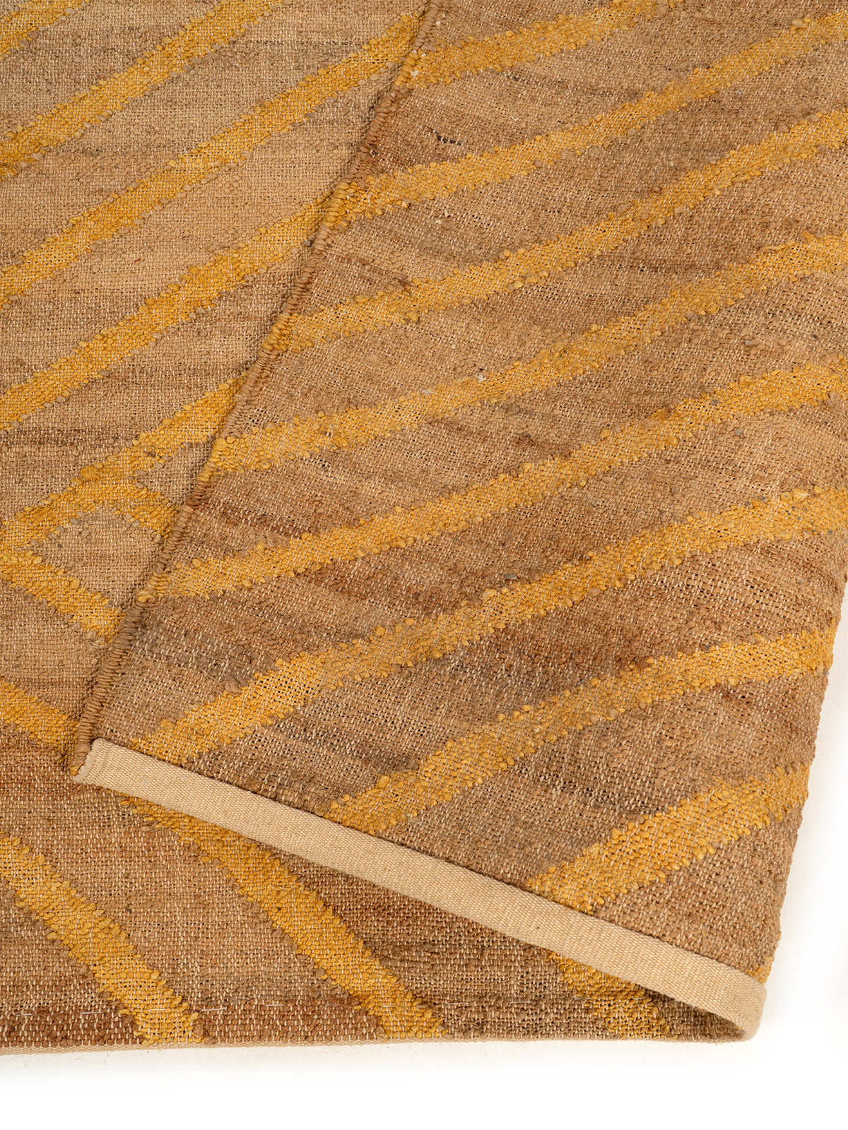 Two-Tone Framed Jute Rug detail of the geometric pattern in jute