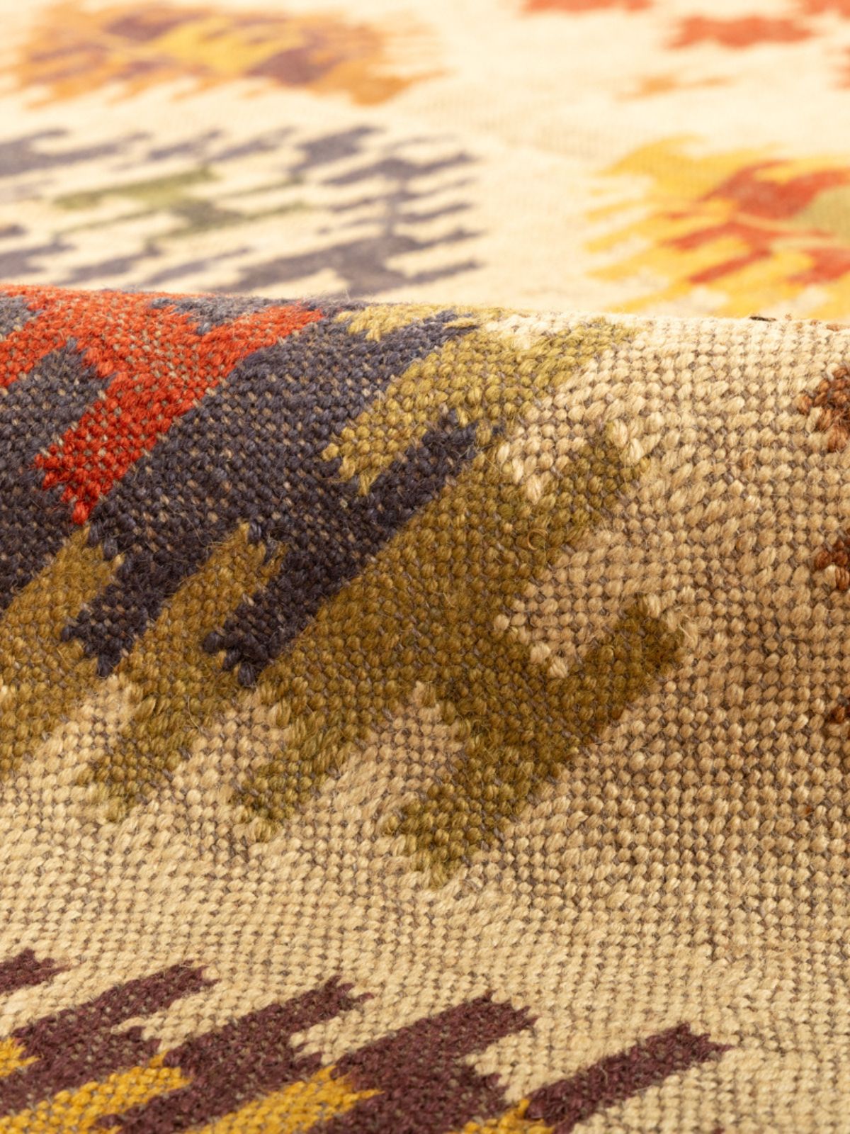Whimsical colourburst Kilim Rug detail of the geometric pattern in cotton