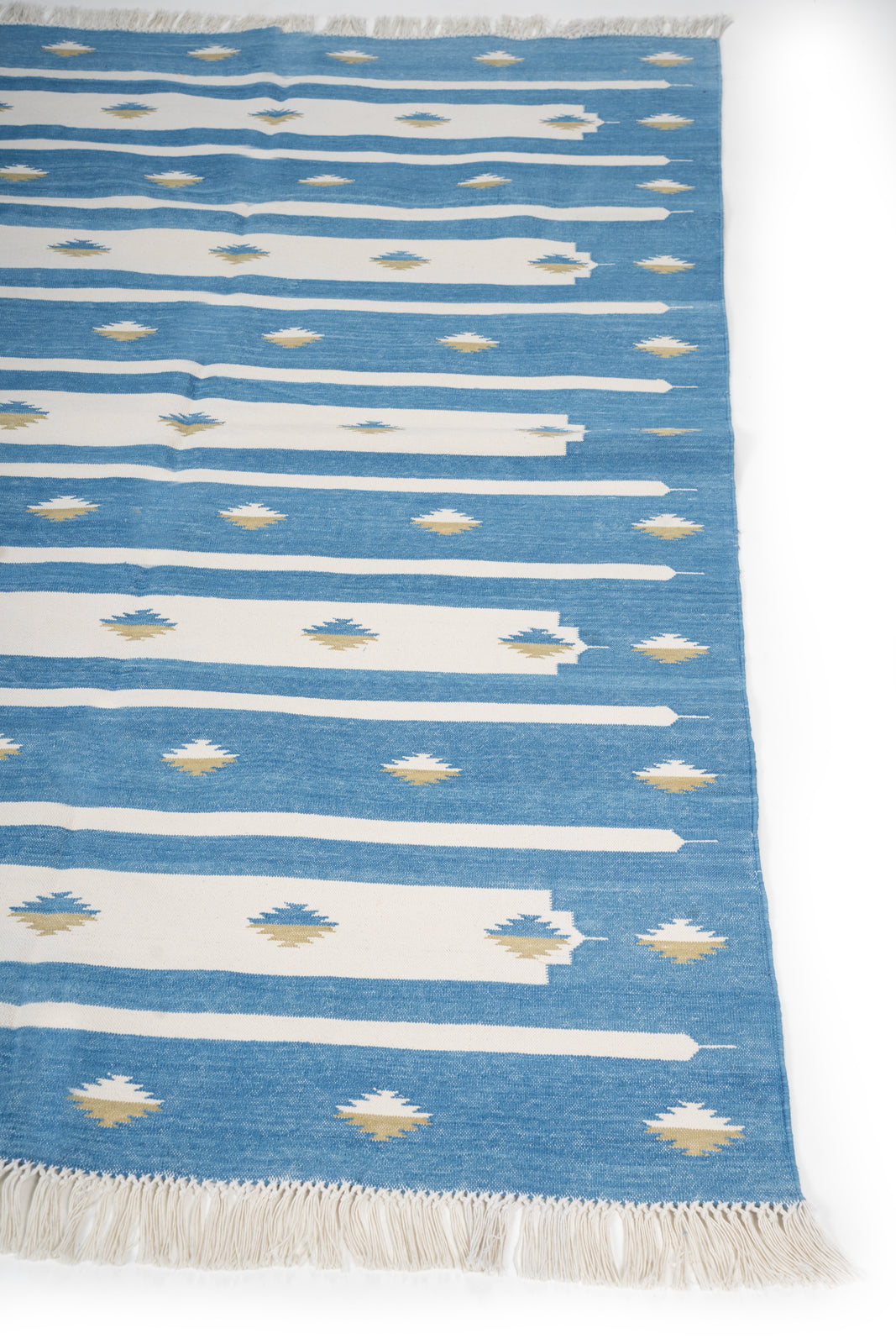 Whisper Tie-Dye Flatweave Rug cotton rug styled in a living room interior