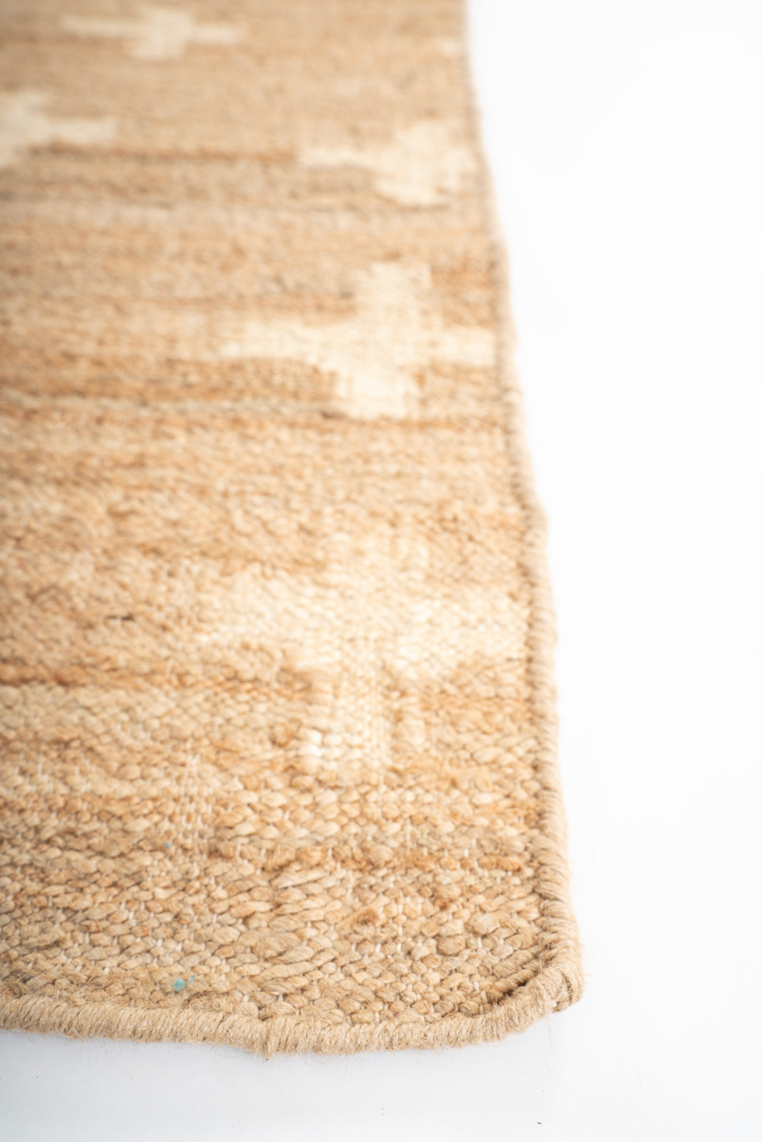 White Cross Jute Rug detail showing jute surface and textured texture
