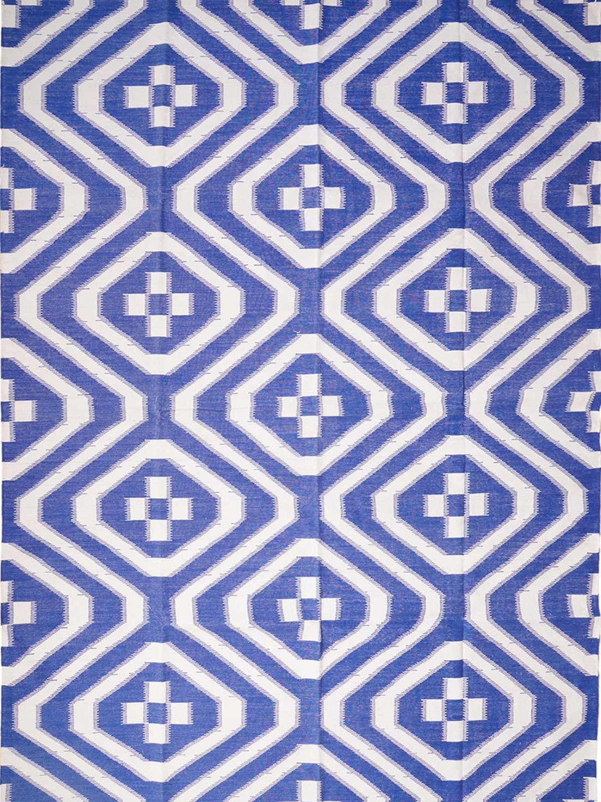 White Wave Ikat Flatweave Rug cotton rug in blue and white tones