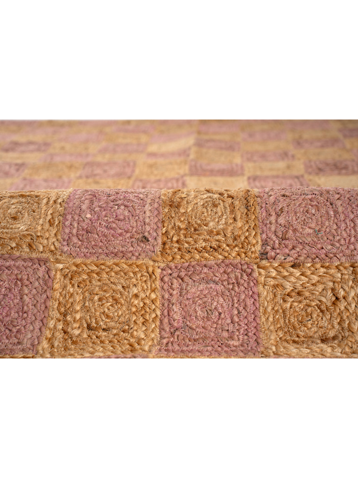 Windsor checkered Jute rug-Dusky pink close-up showing the jute weave and geometric motif