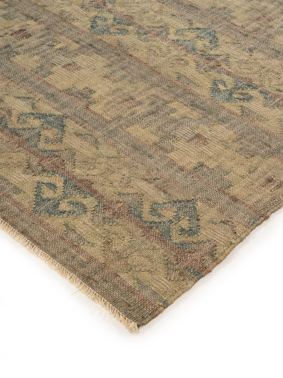 Woven Earth Chevron Jute Rug close-up showing the jute weave and geometric motif
