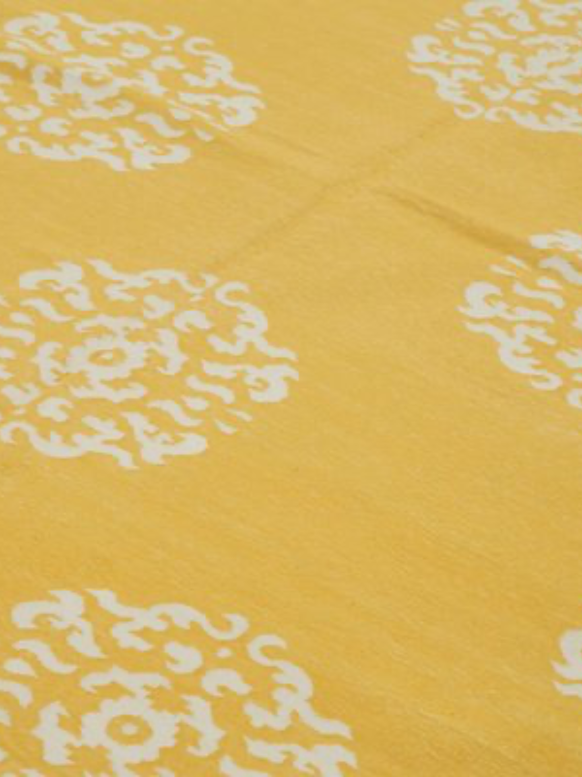 Yellow Medallion Cotton Rug detail of the traditional motif in cotton