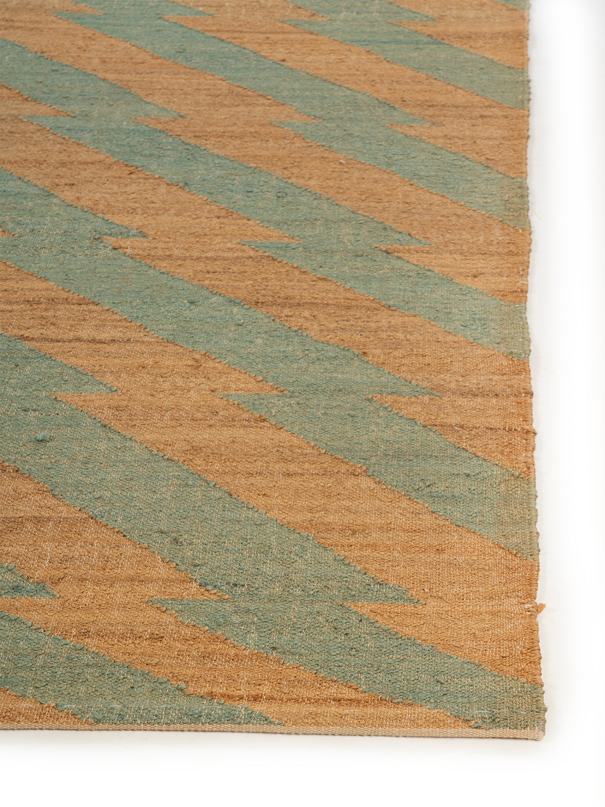Zigzag Dune Jute Rug jute rug styled in a living room interior
