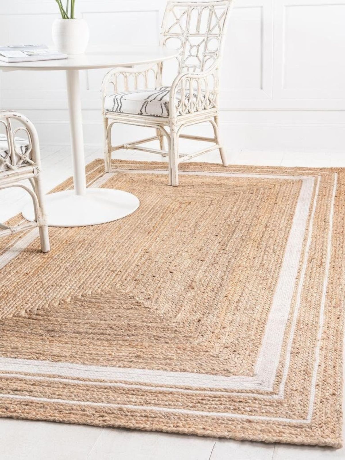 Suez bordered jute braided area rug