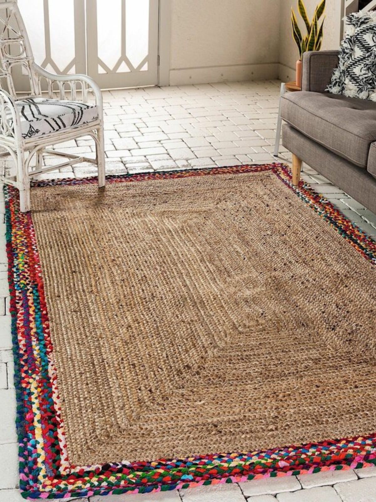 Meru bordered braided area rug