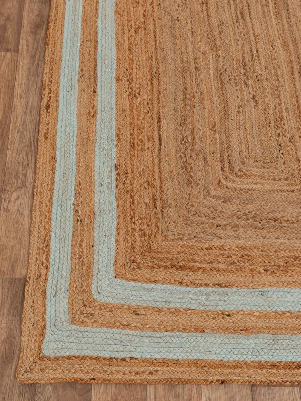 Niamey double border jute braided area rug