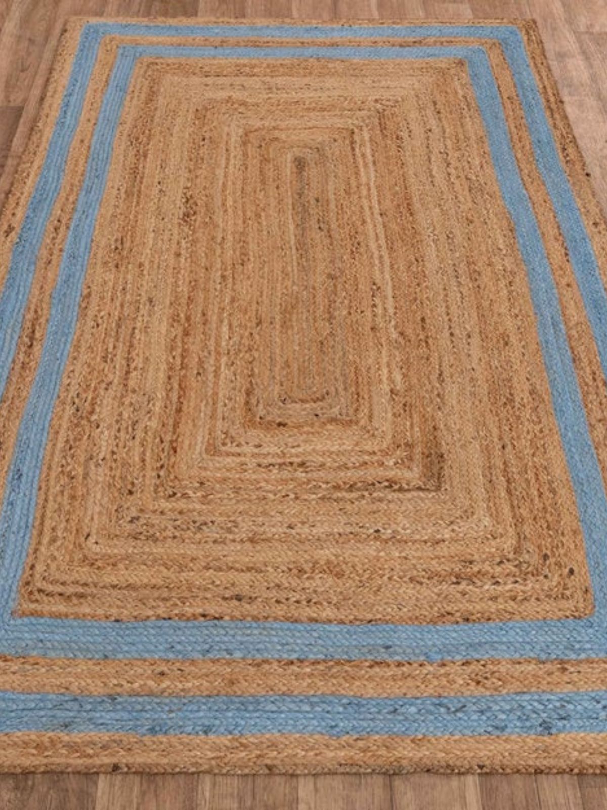 Niamey double border jute braided area rug