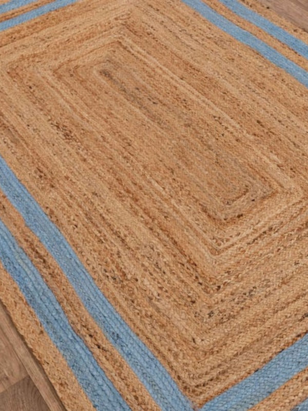 Niamey double border jute braided area rug