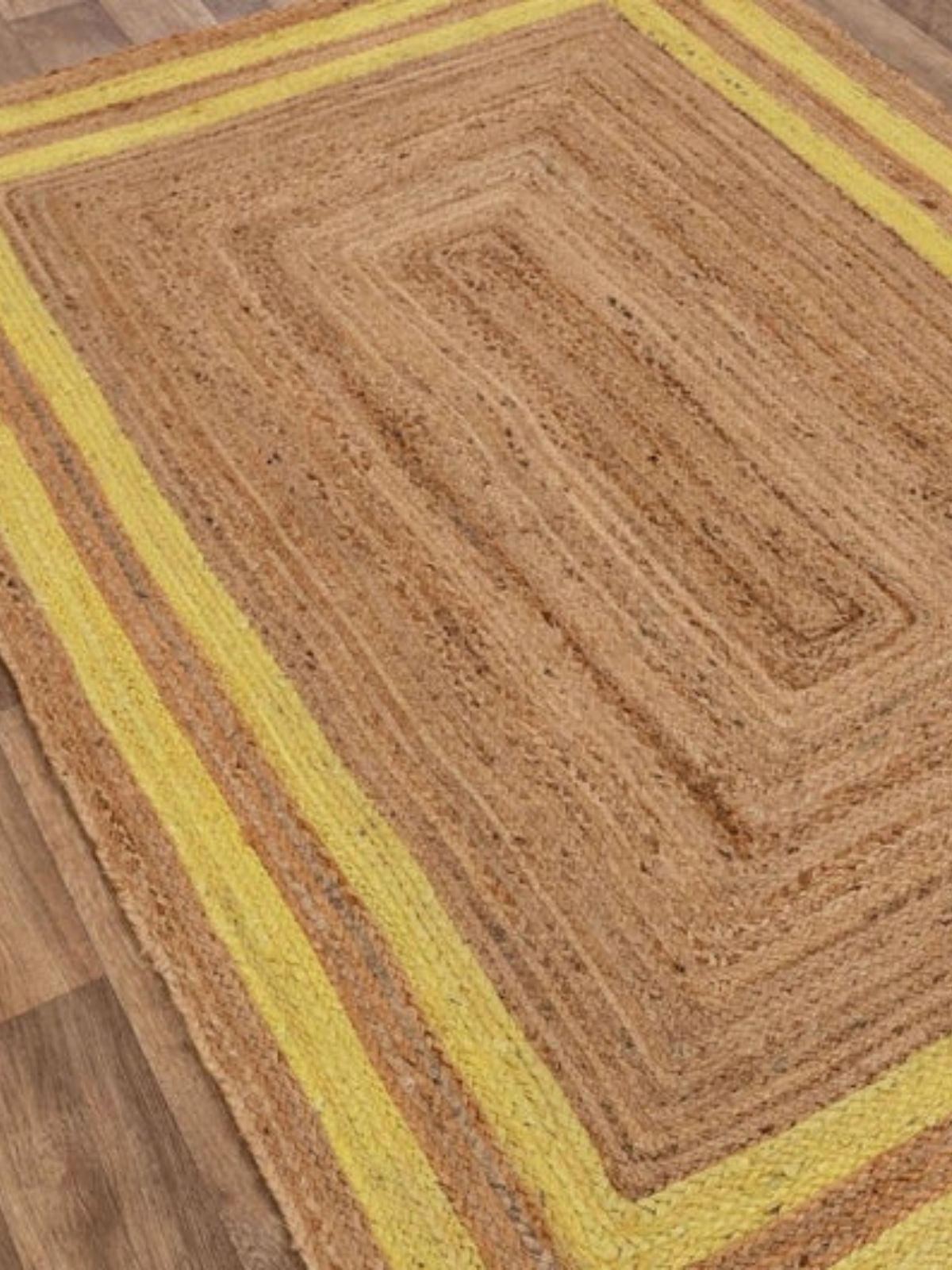 Niamey double border jute braided area rug