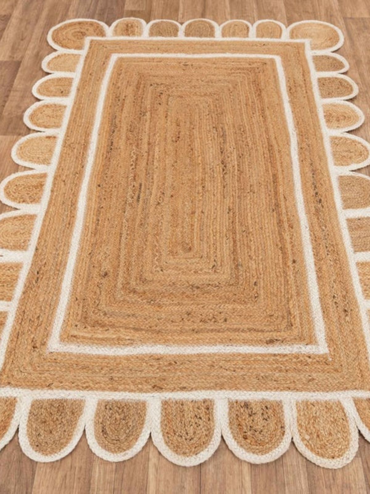 Luxor scalloped braided area rug