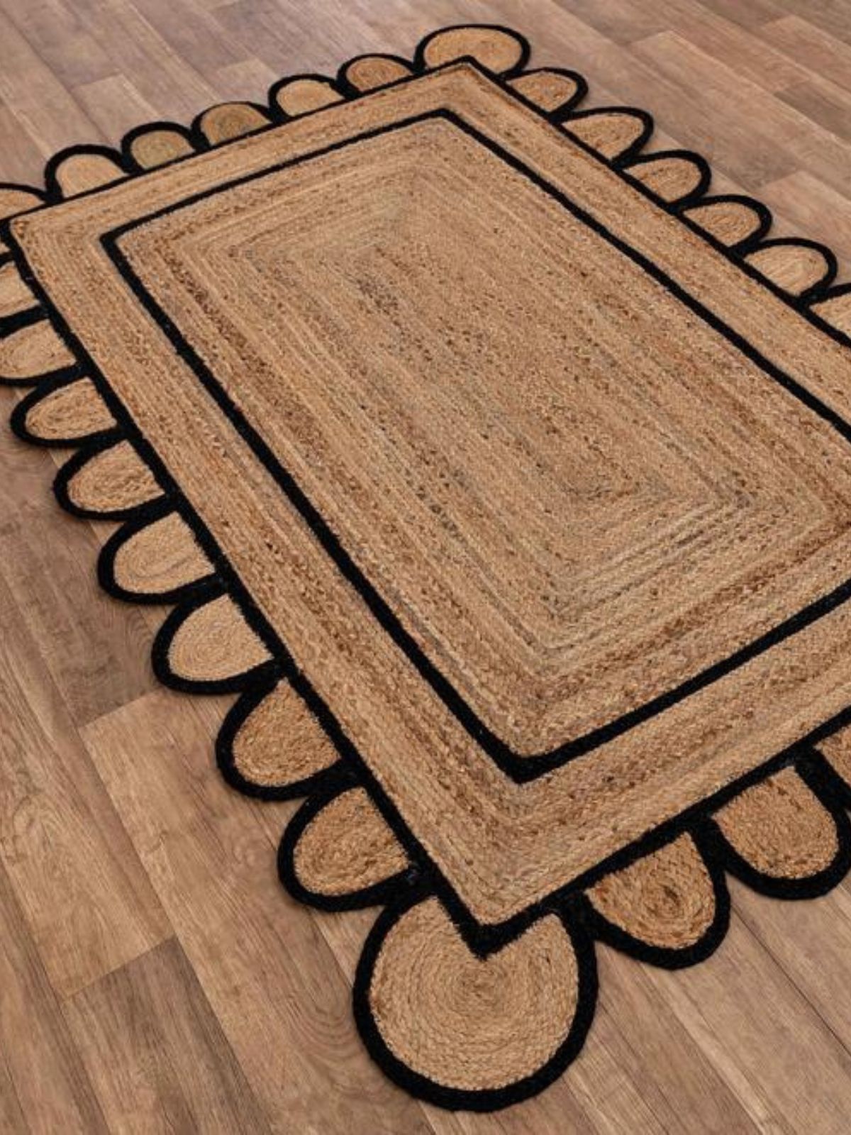 Luxor scalloped braided area rug