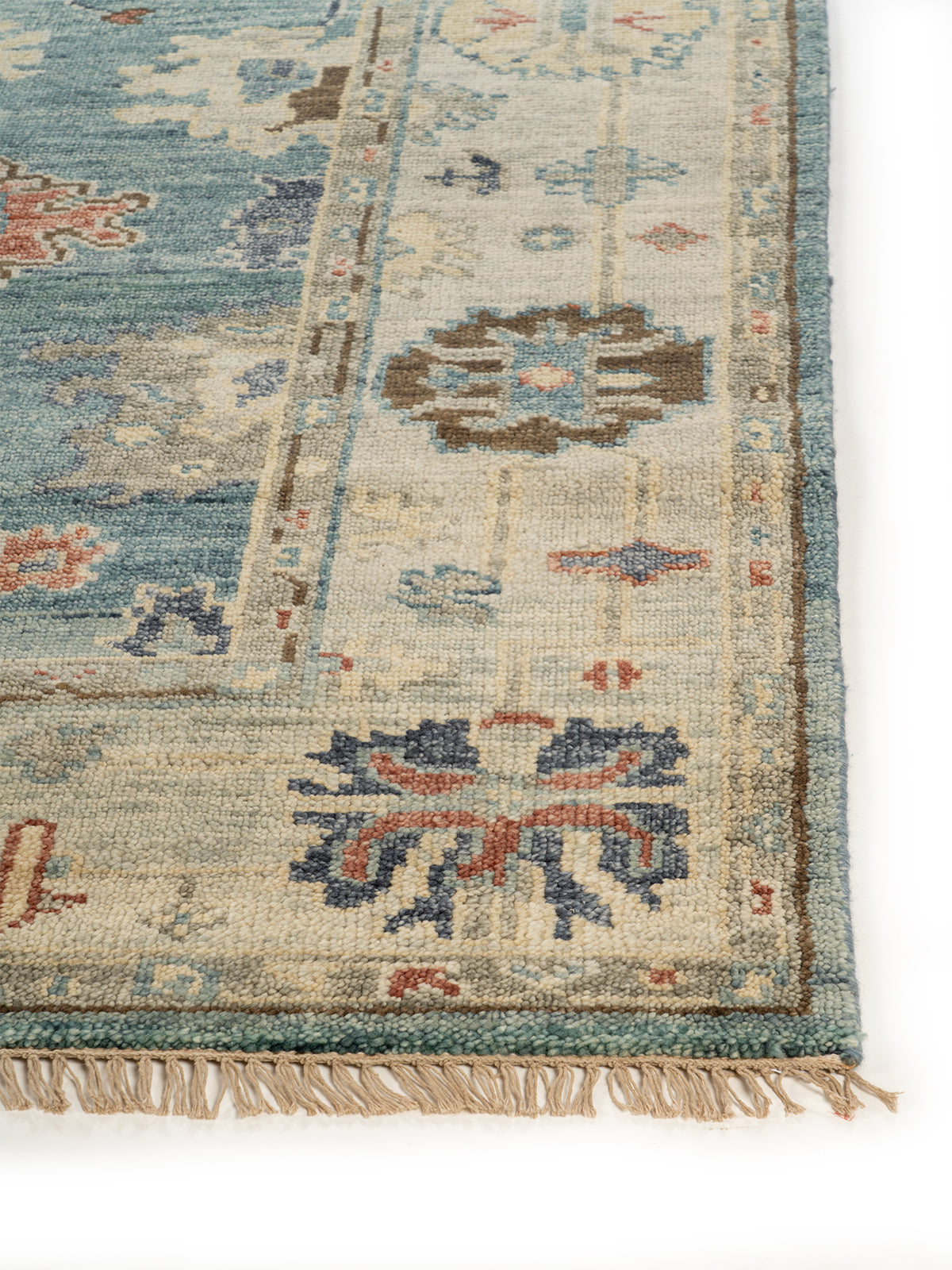 Aegean Medallion Wool Rug handspun wool rug styled in a living room interior