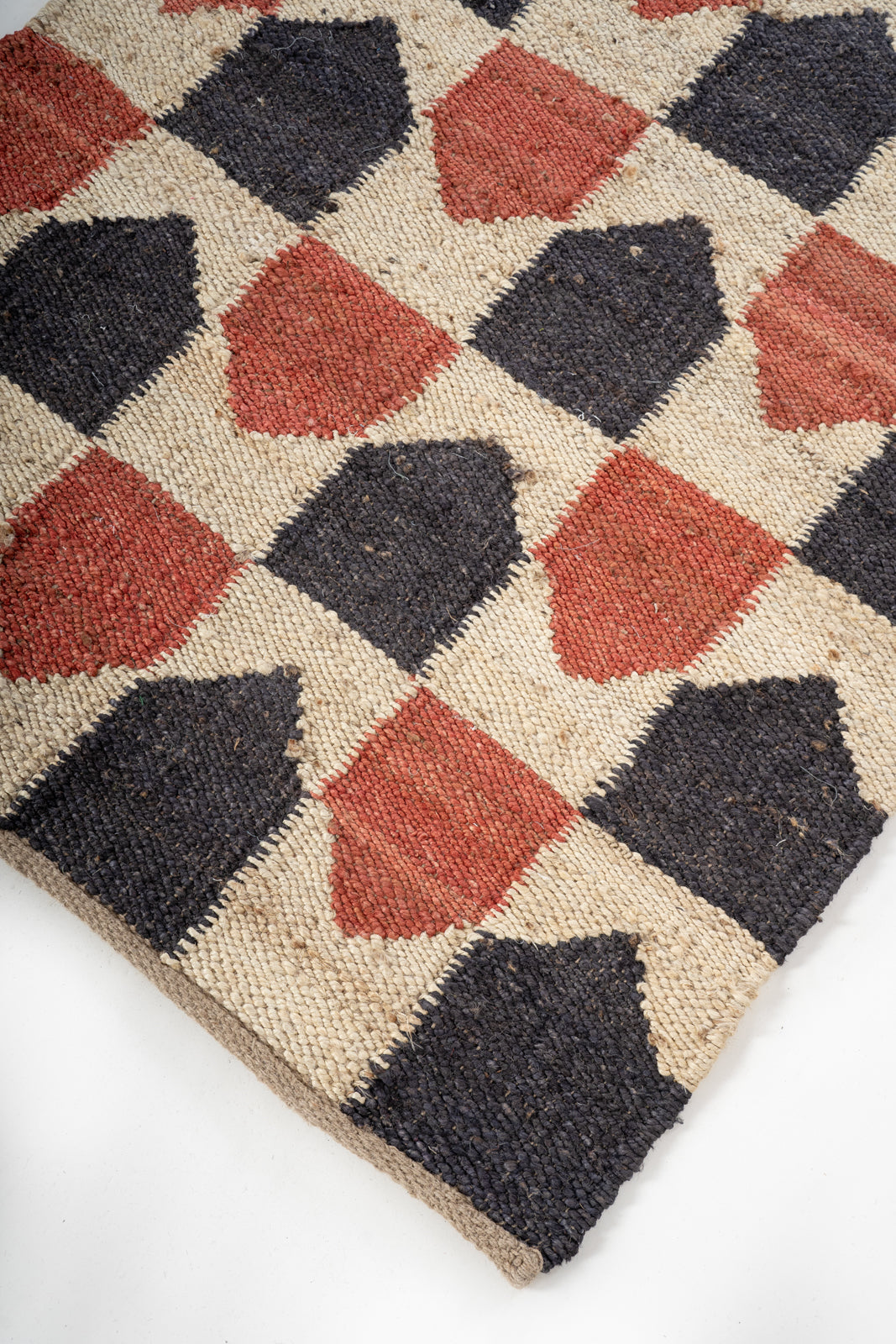 Amber Citadel Jute Rug close-up showing the jute weave and geometric motif