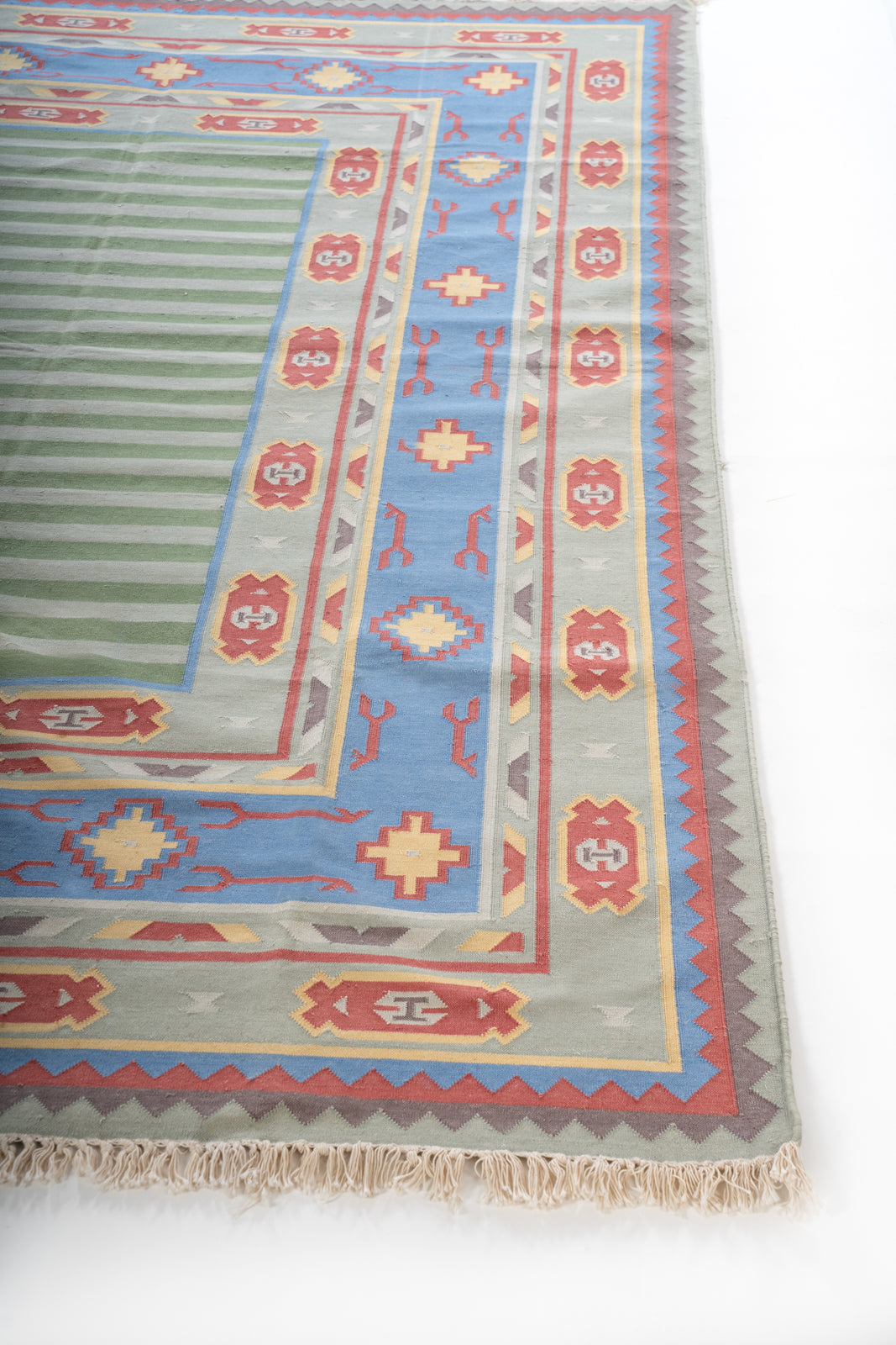 Amritsar Elegance Vintage Dhurrie Rug cotton rug styled in a living room interior