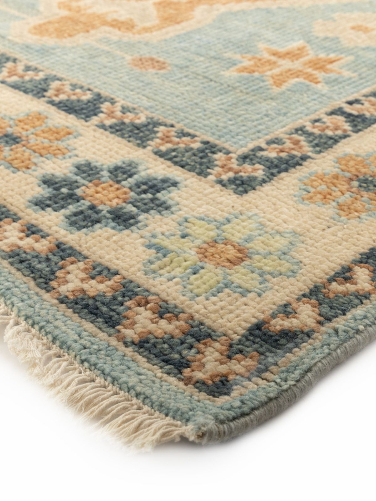 Anatolian Essence Turkish Oushak Rug close-up showing the wool weave and traditional motif