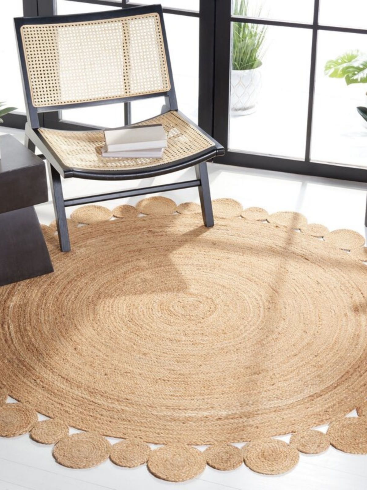 Andony round jute rug jute rug styled in a living room interior