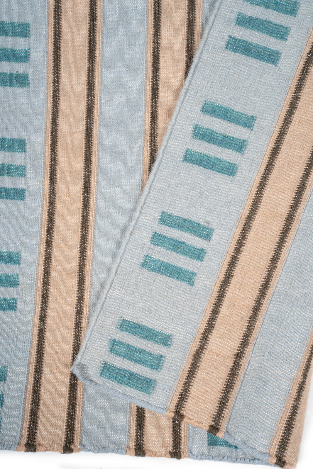 Aqua Breeze Wool Runner detail showing edge binding and wool finishing of the runner