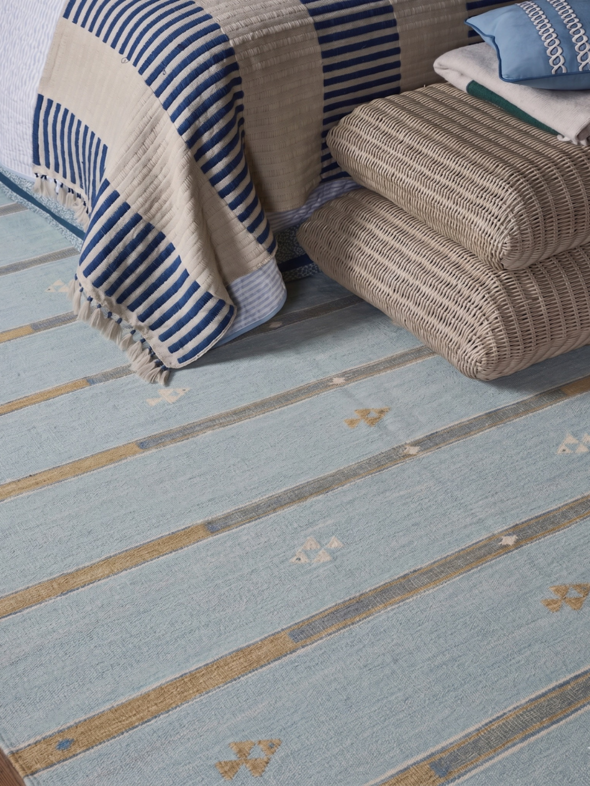 Aqua Shoal Wool Rug wool rug styled in a living room interior