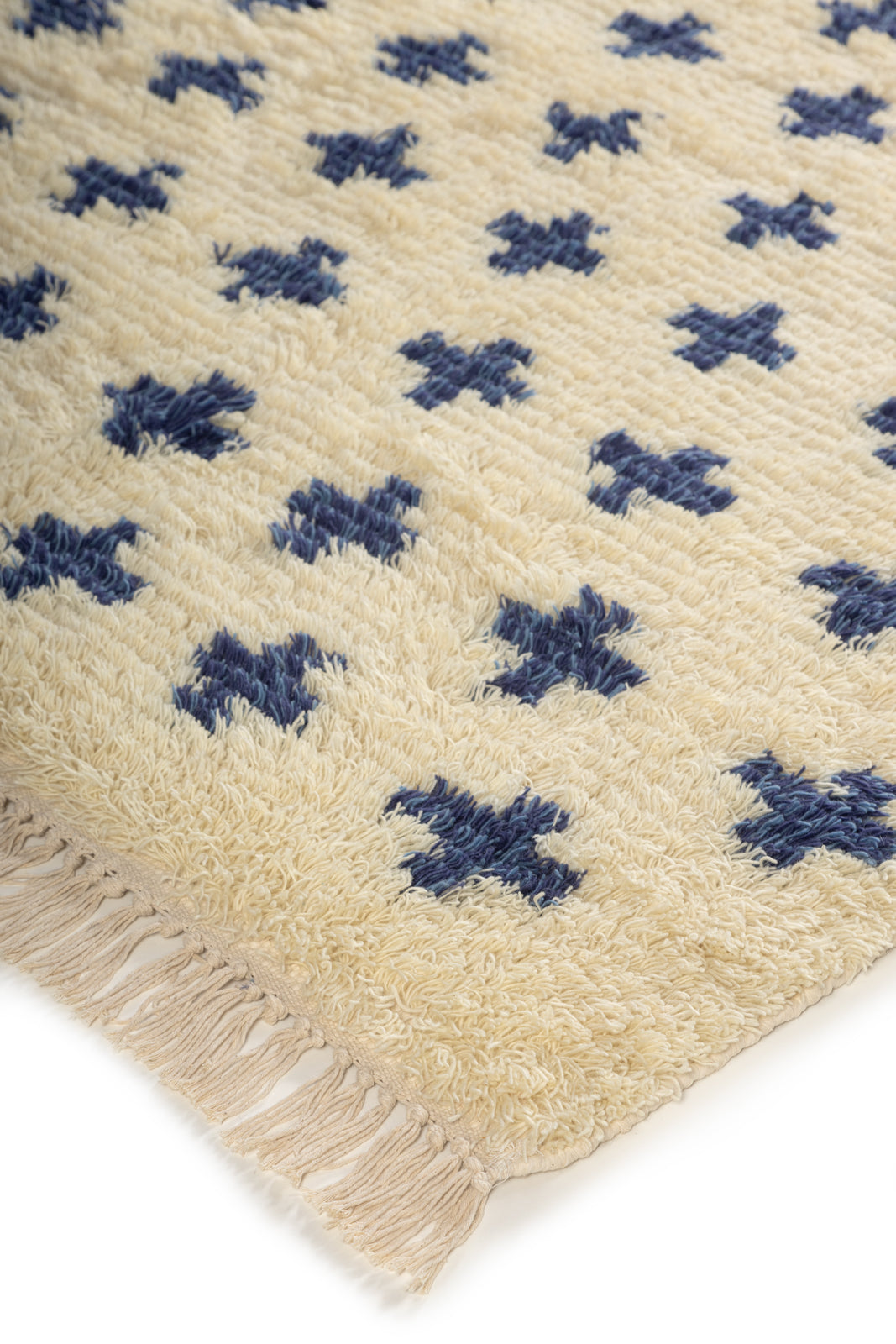 Arctic Bloom Wool Rug close-up showing the wool pile and floral motif