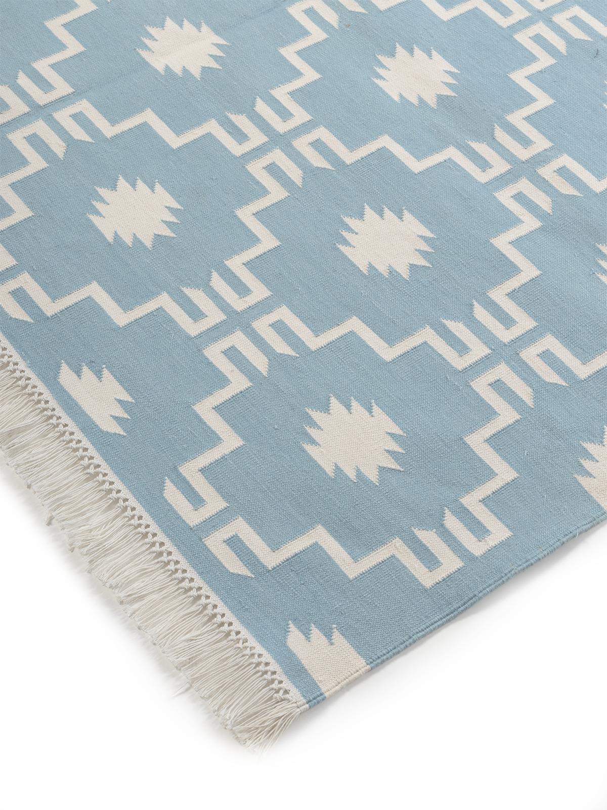 Arctic Echo Rug close-up showing the cotton weave and geometric motif