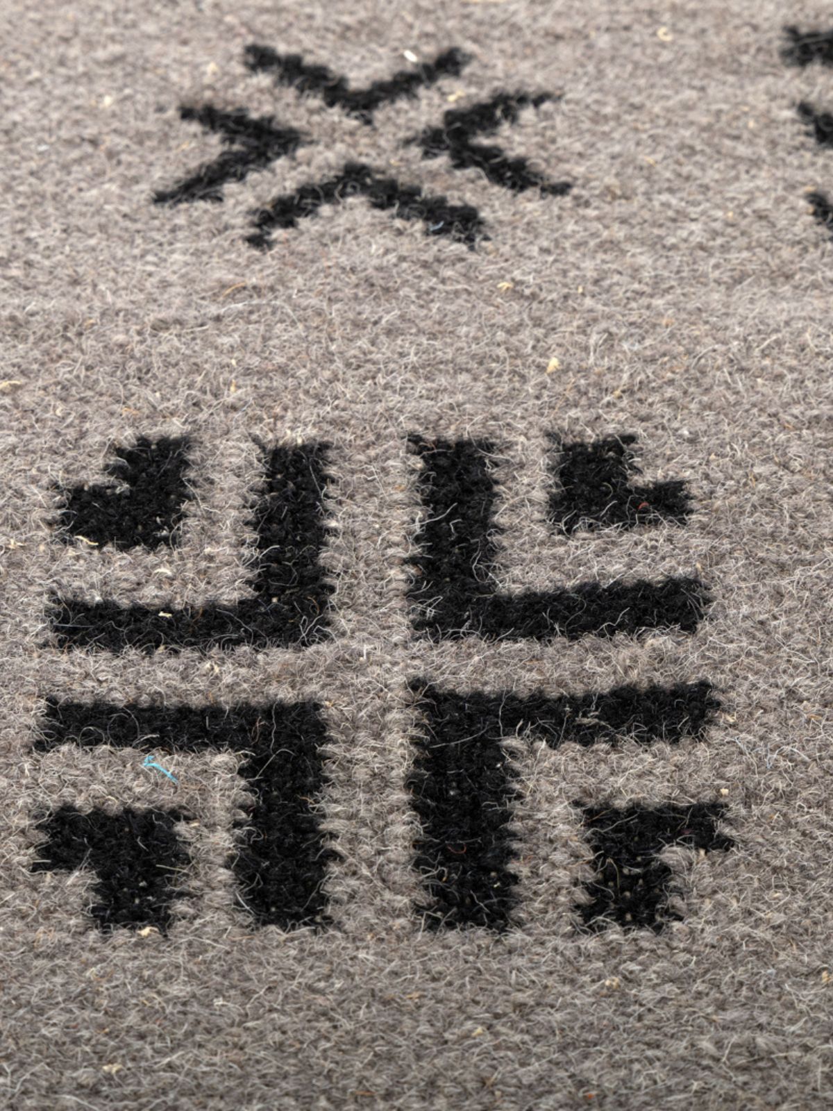 Arrow Dot Weave Rug - texture detail showing cotton surface